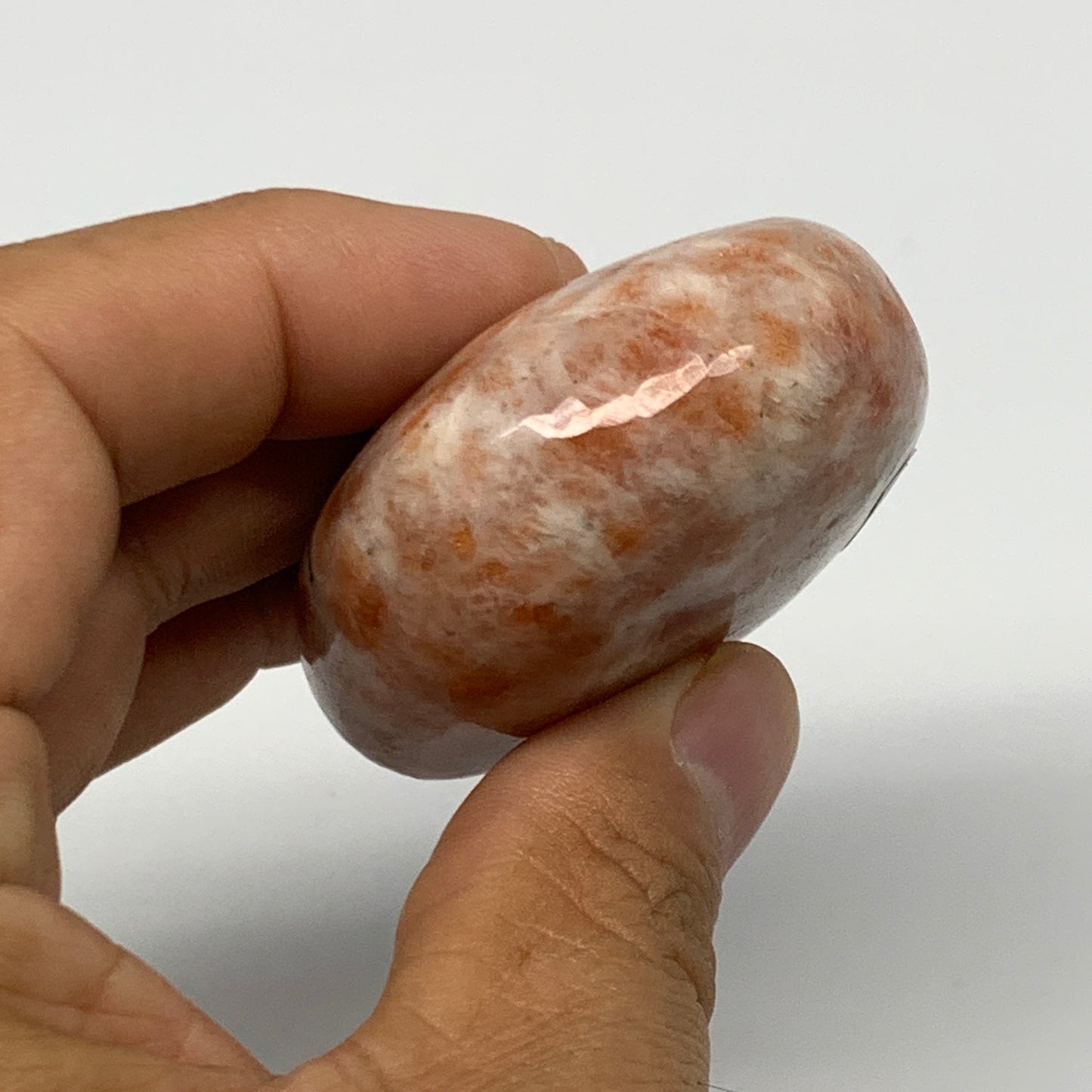 101.1g, 2.4"x1.7"x0.9", Natural Sunstone Palm-Stone Polished from India, B22006