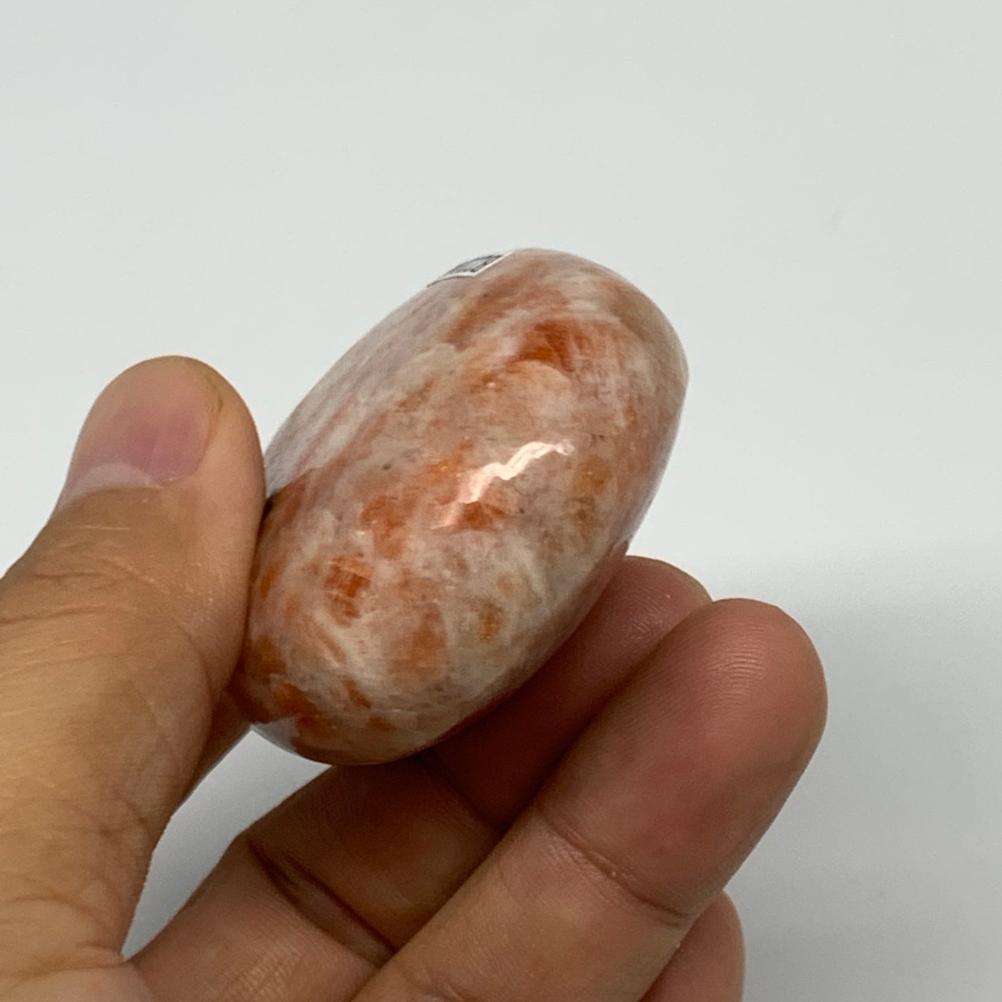 101.1g, 2.4"x1.7"x0.9", Natural Sunstone Palm-Stone Polished from India, B22006