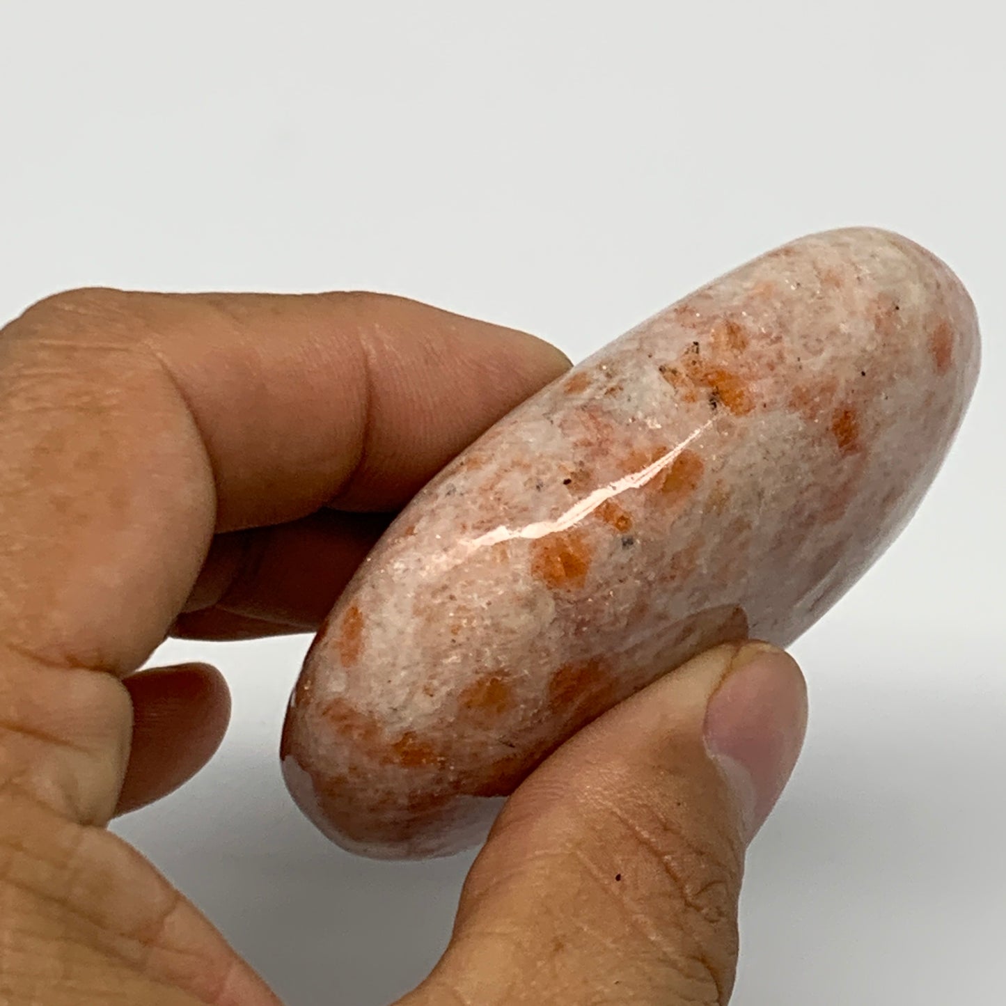 109.3g, 2.6"x1.8"x0.9", Natural Sunstone Palm-Stone Polished from India, B22010