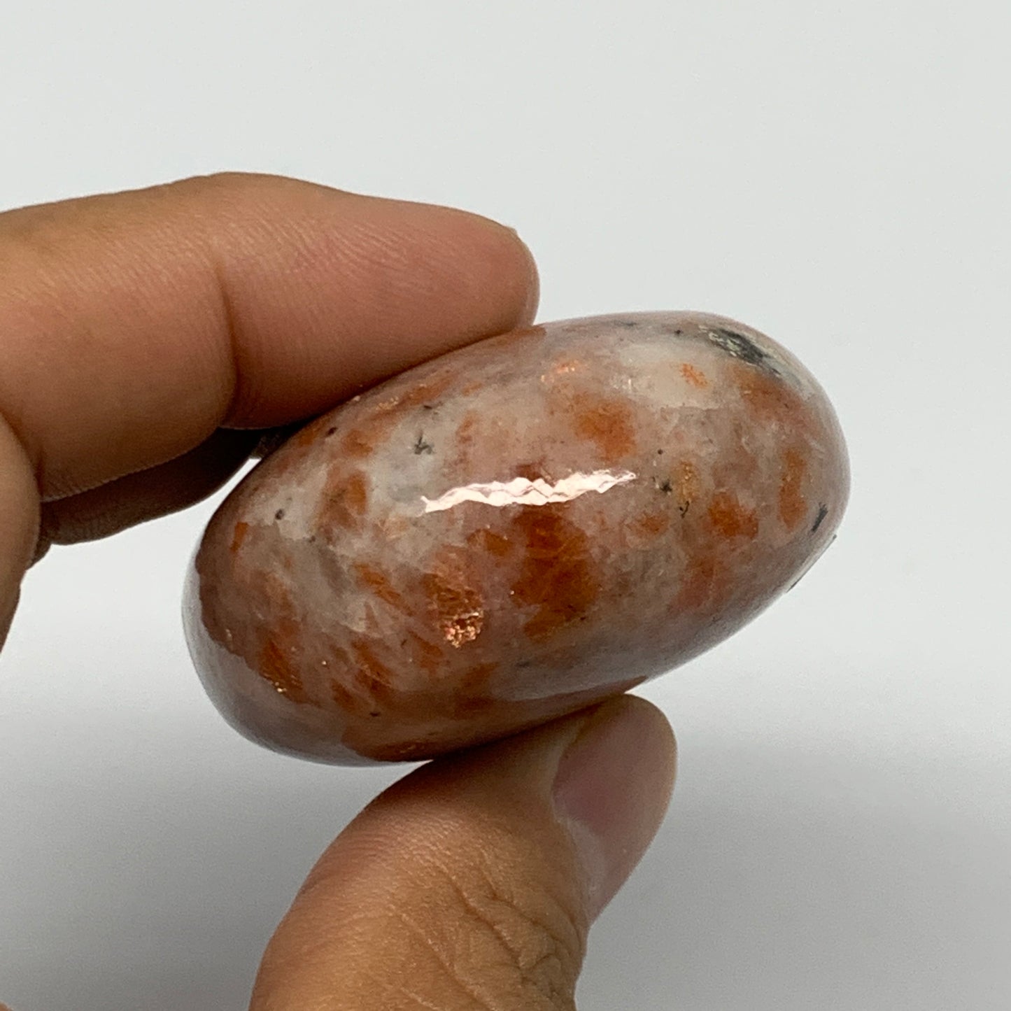 97.6g, 2.4"x1.7"x1", Natural Sunstone Palm-Stone Polished from India, B22015