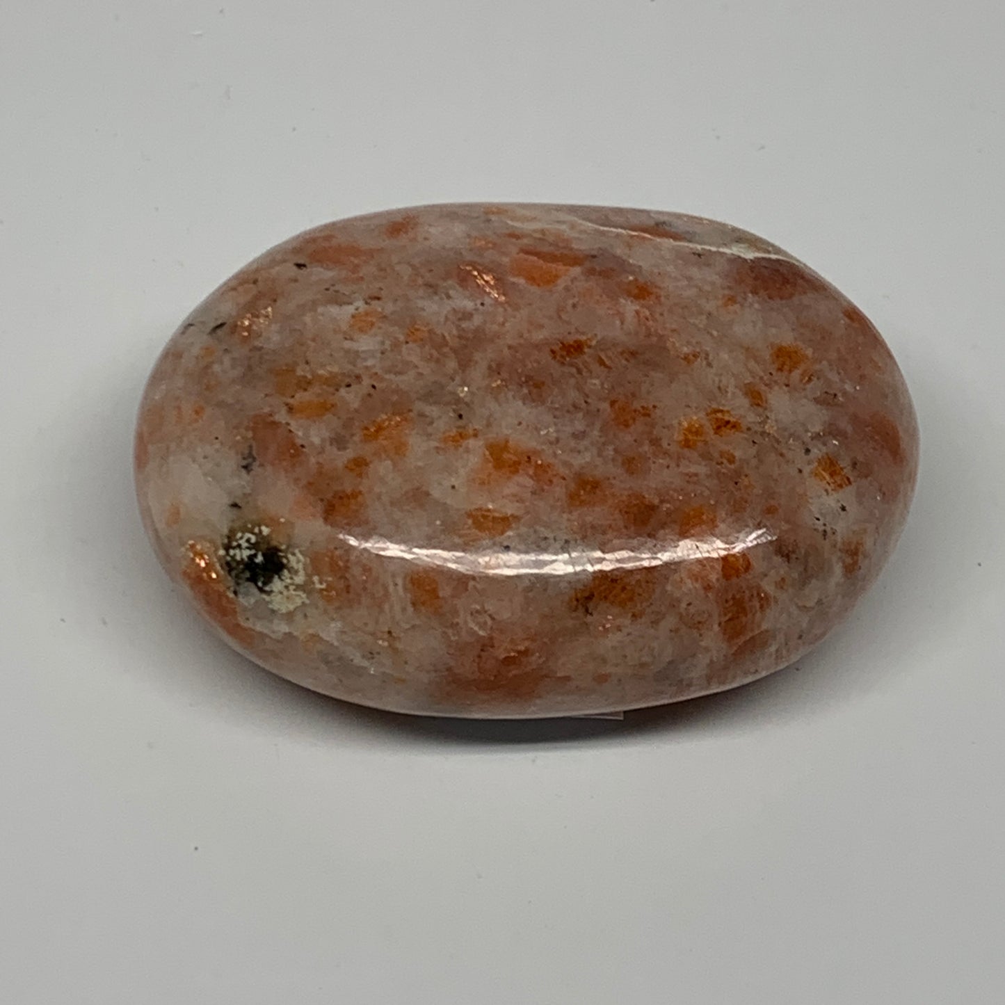 97.6g, 2.4"x1.7"x1", Natural Sunstone Palm-Stone Polished from India, B22015