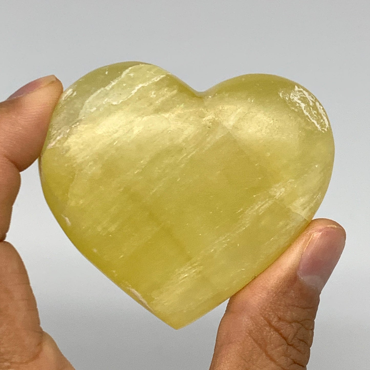 120.2g, 2.2"x2.5"x0.9" Lemon Calcite Heart Crystal Gemstones @Afghanistan,B26840
