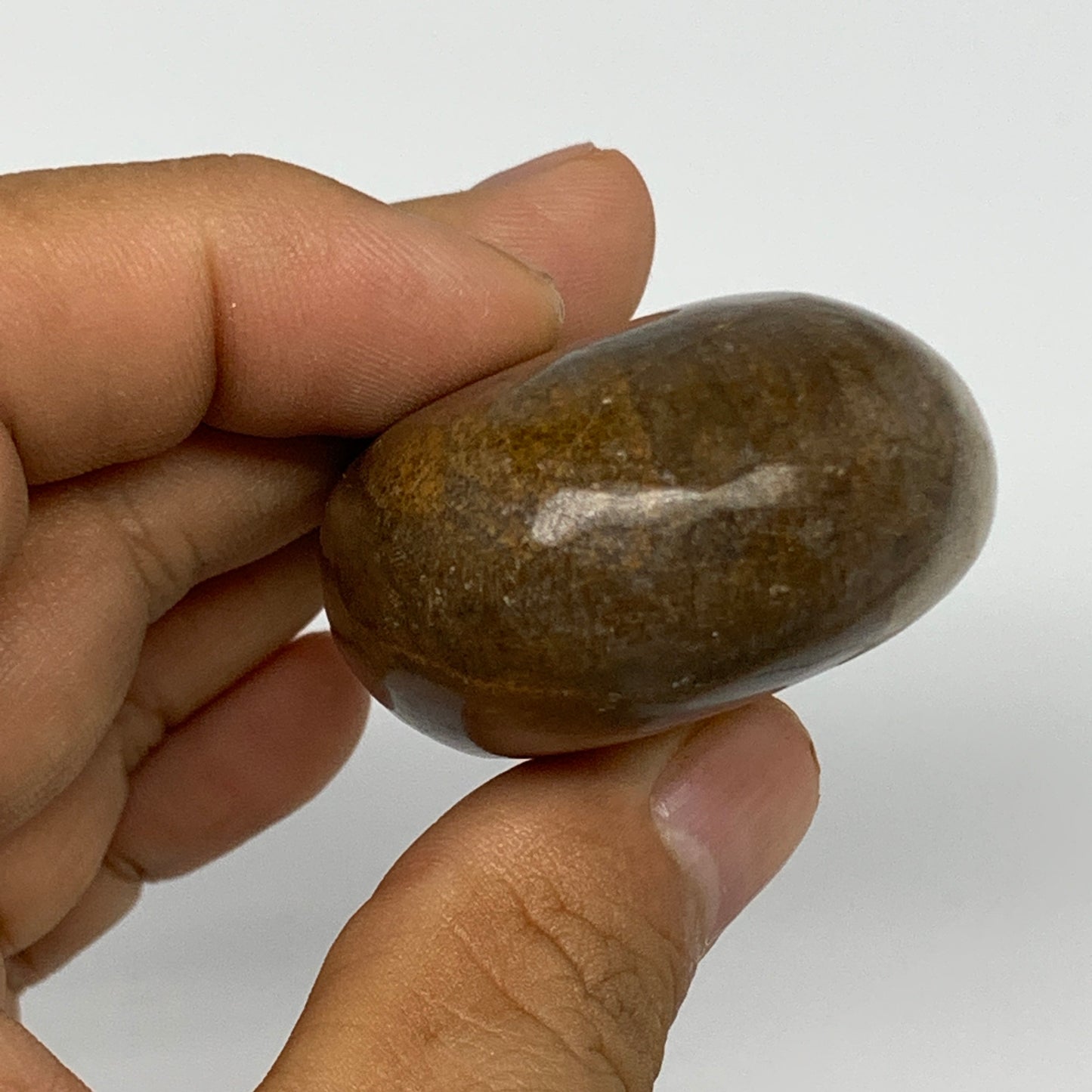 106.8g, 2.6"x1.6"x0.9", Honey Calcite Palm-Stone Reiki @Afghanistan, B14901