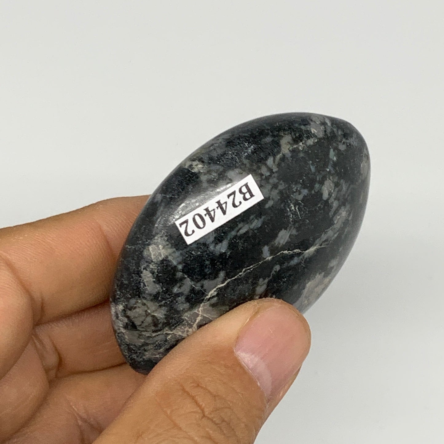 83.9g, 2.3"x1.8"x0.8", Indigo Gabro (Merlinite) Palm-Stone @Madagascar, B24402