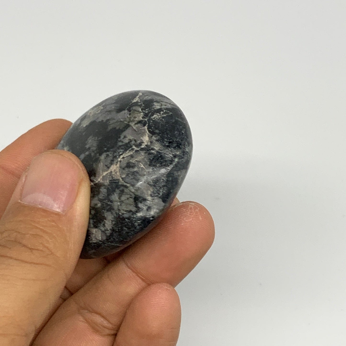 83.9g, 2.3"x1.8"x0.8", Indigo Gabro (Merlinite) Palm-Stone @Madagascar, B24402