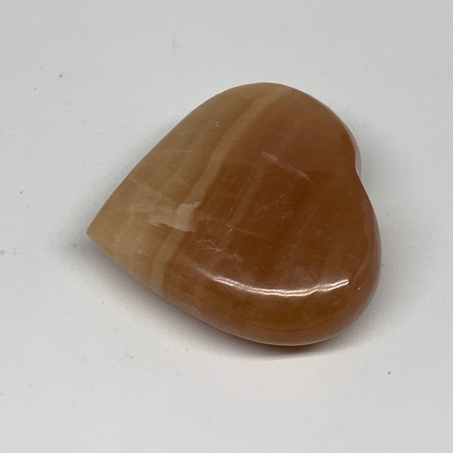 148.1g, 2.5"x2.7"x1" Honey Calcite Heart Gemstones from Pakistan, B24430