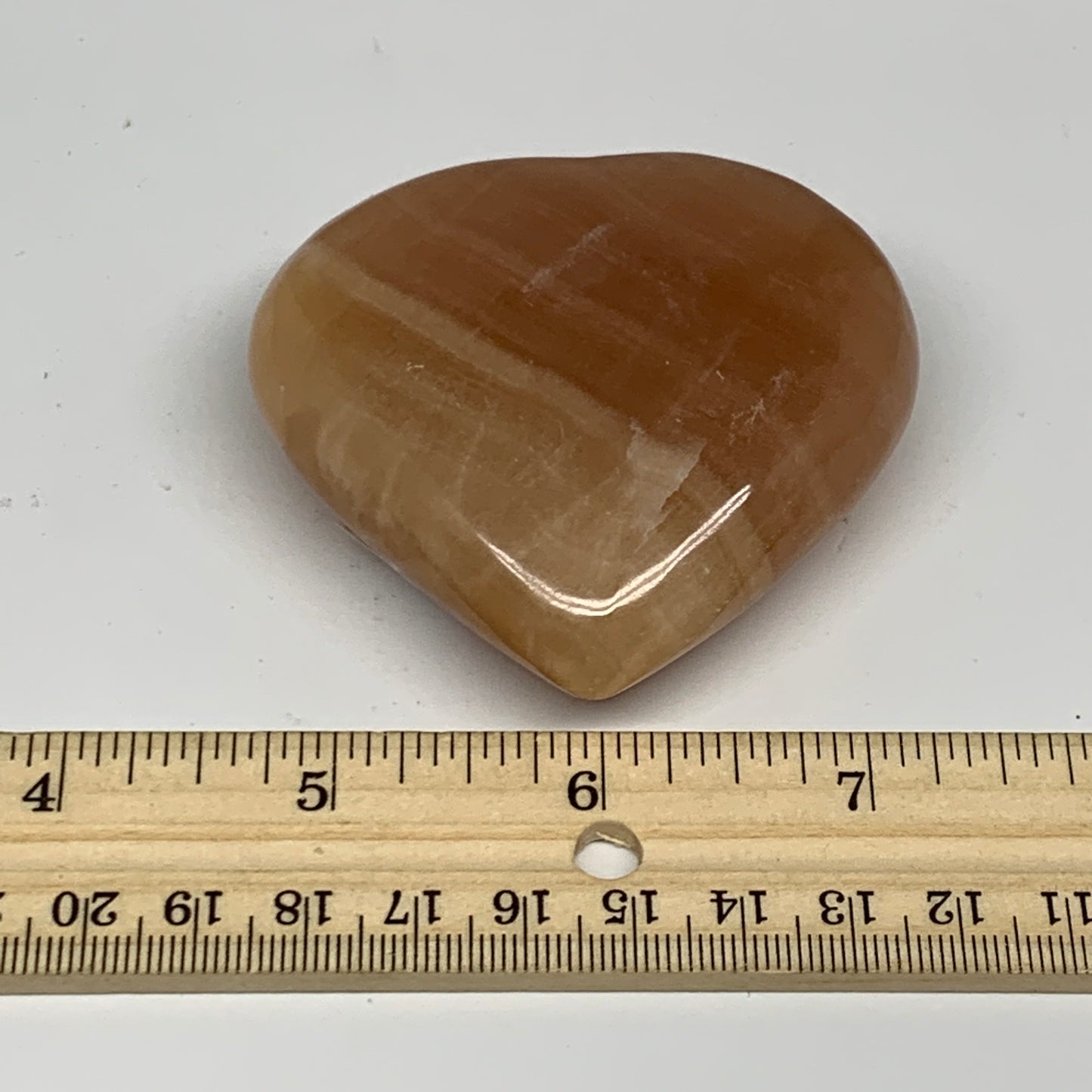 148.1g, 2.5"x2.7"x1" Honey Calcite Heart Gemstones from Pakistan, B24430