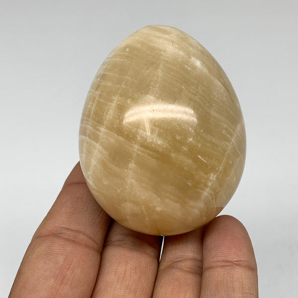 178.5g, 2.3"x1.9" Natural Brown Calcite Egg Shiny Polished @Madagascar, B2692