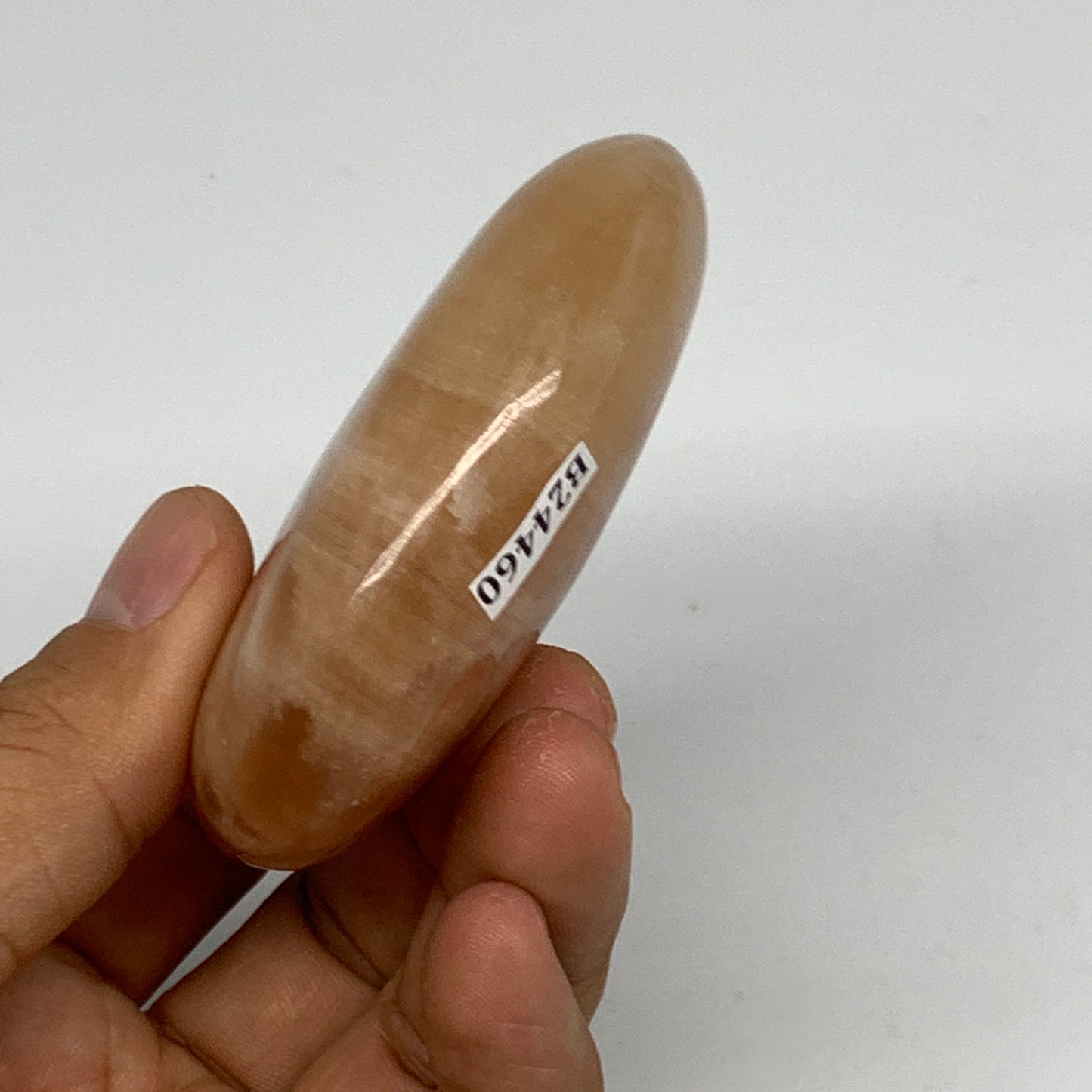 155.2g, 2.7"x2.3"x0.9",Honey Calcite Palm-Stone Crystal Polished @Pakistan,B2446