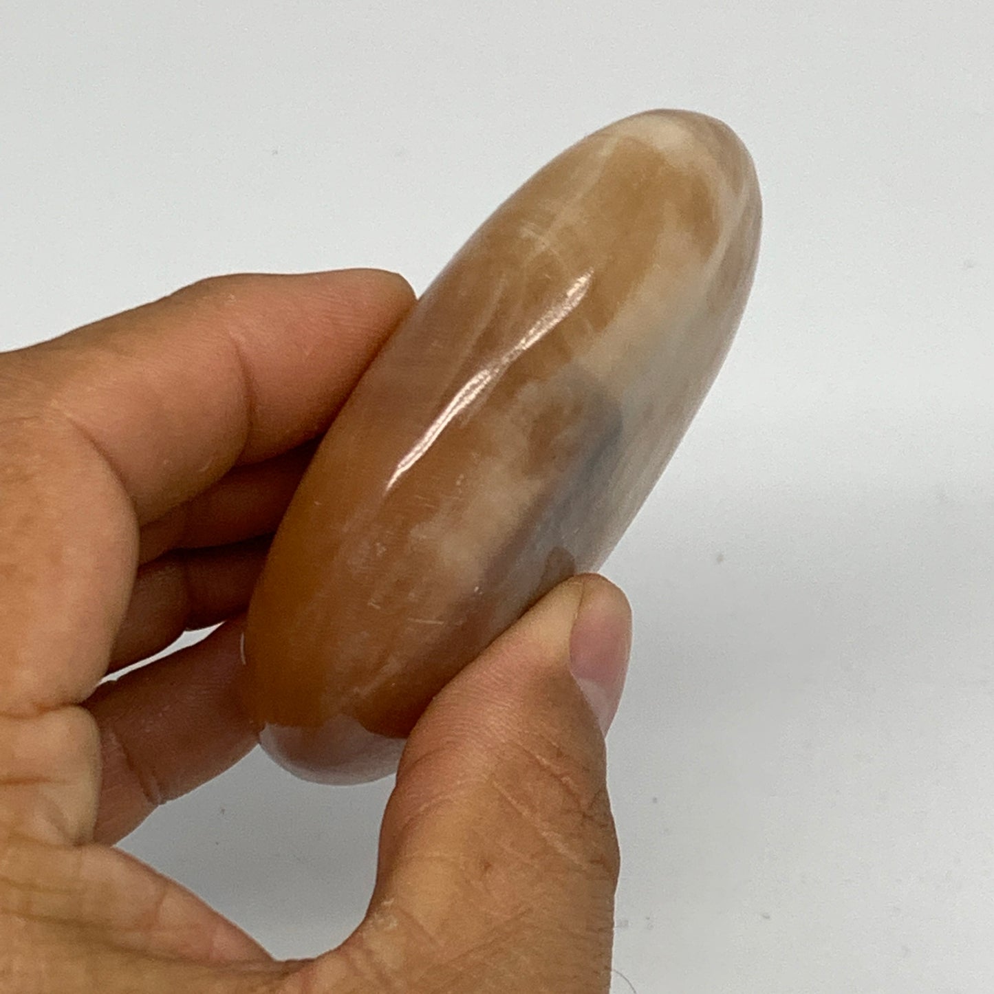 155.2g, 2.7"x2.3"x0.9",Honey Calcite Palm-Stone Crystal Polished @Pakistan,B2446