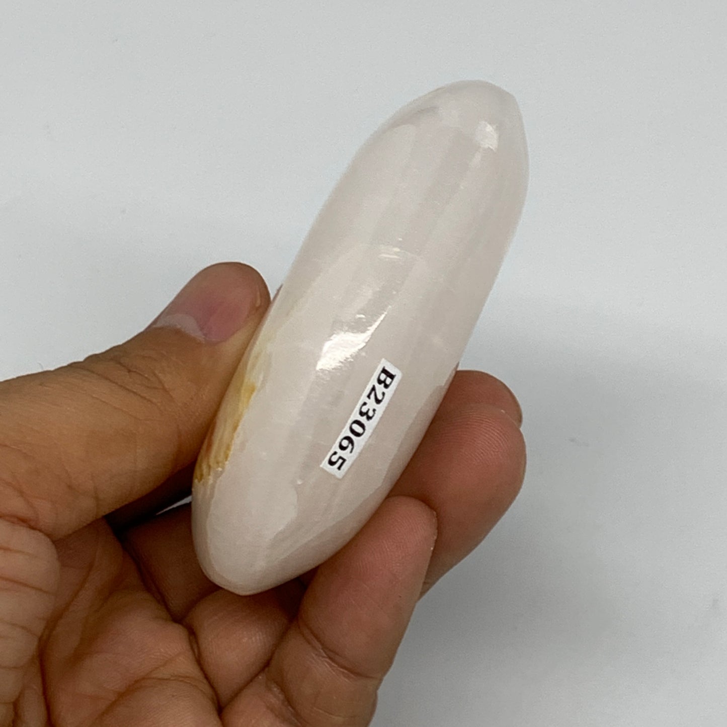 167.8g,3"x2.1"x1",Pink Calcite Palm-Stone Crystal Polished,B23065