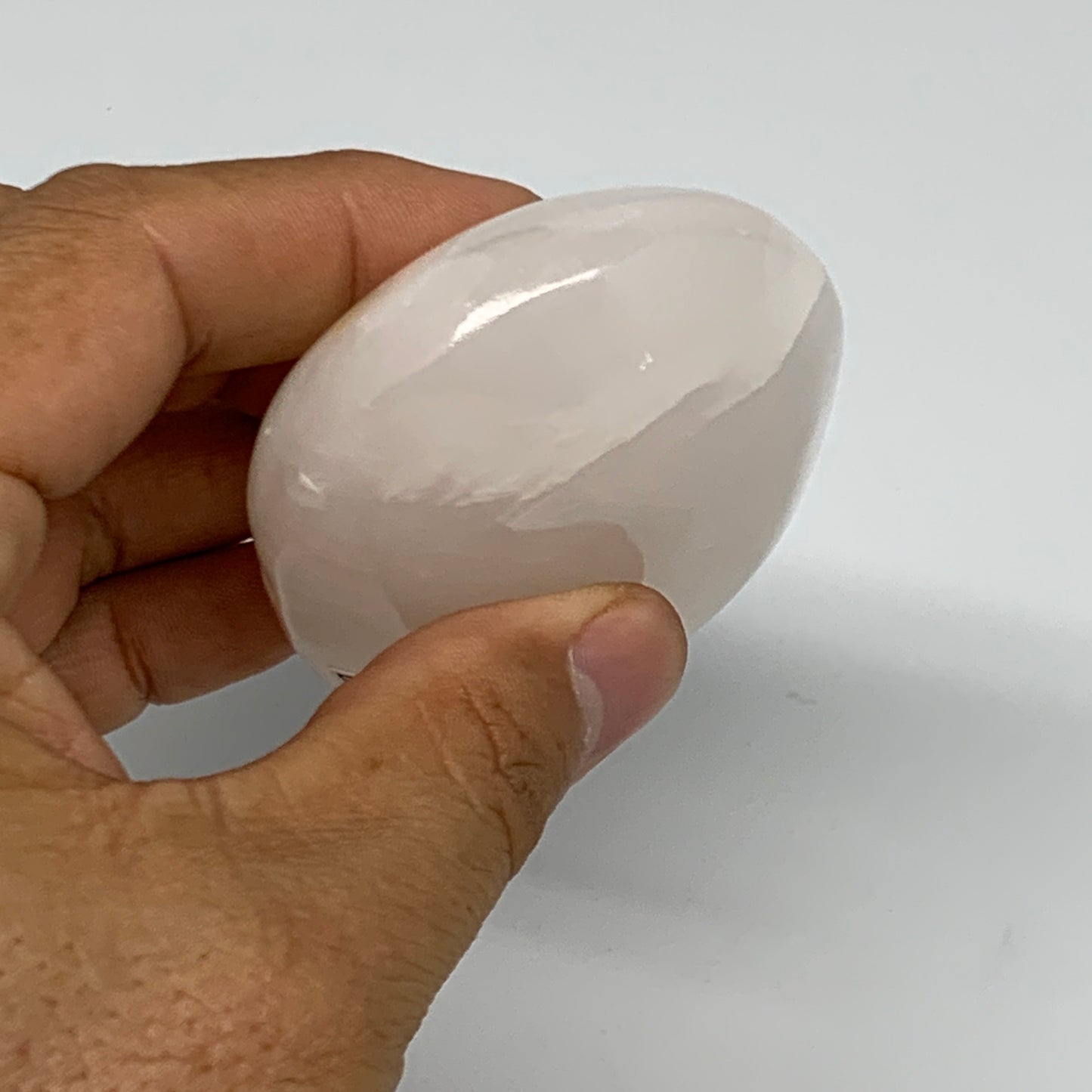 167.8g,3"x2.1"x1",Pink Calcite Palm-Stone Crystal Polished,B23065