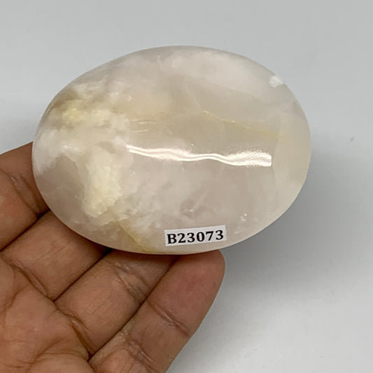147.7g,2.8"x2.1"x1.1",Pink Calcite Palm-Stone Crystal Polished,B23073