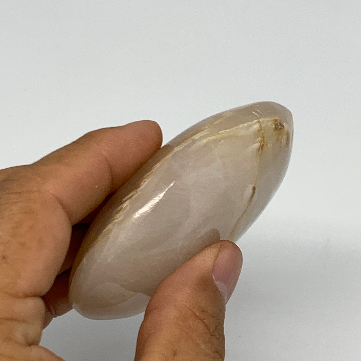 155.1g,3"x2.2"x1",Pink Calcite Palm-Stone Crystal Polished,B23075