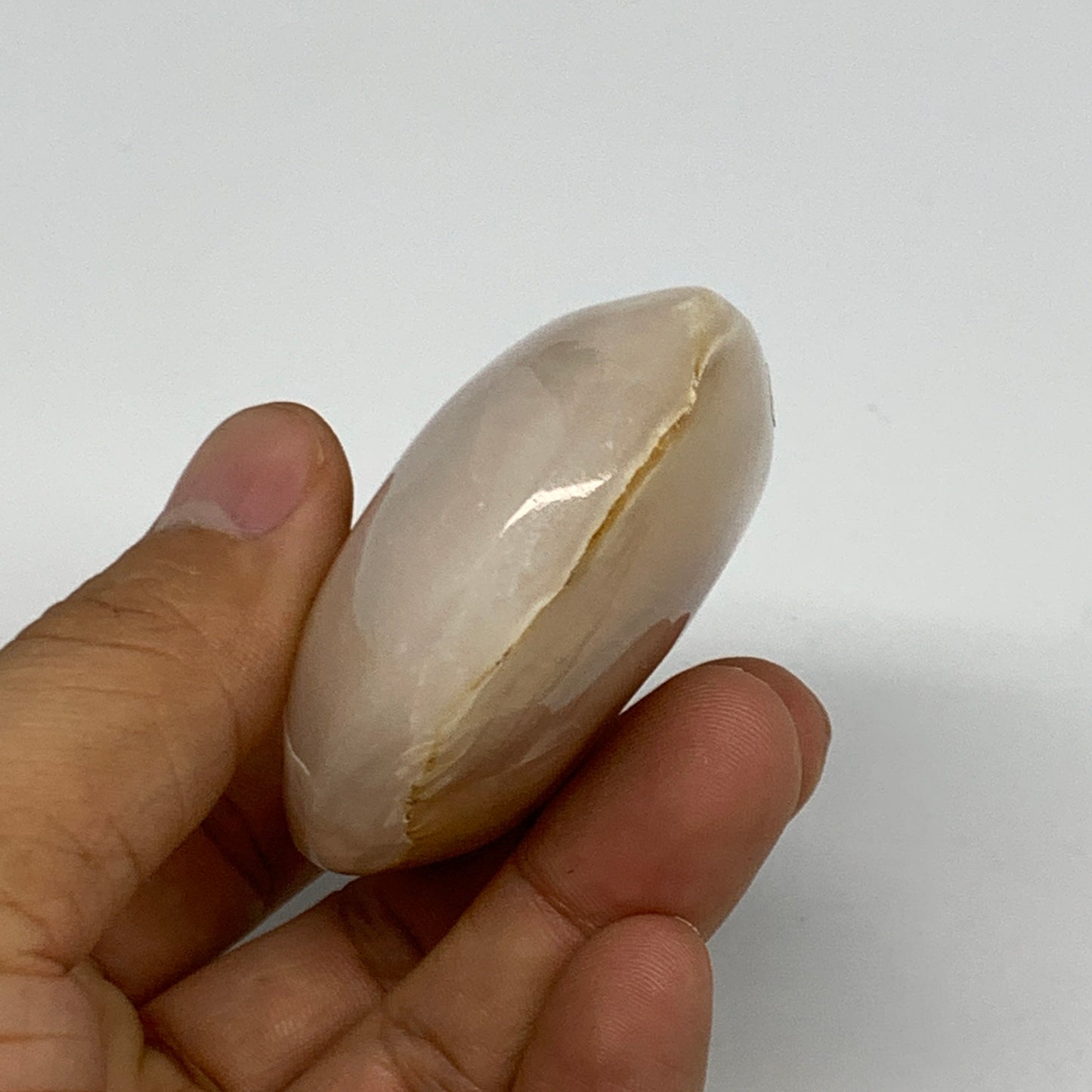 155.1g,3"x2.2"x1",Pink Calcite Palm-Stone Crystal Polished,B23075