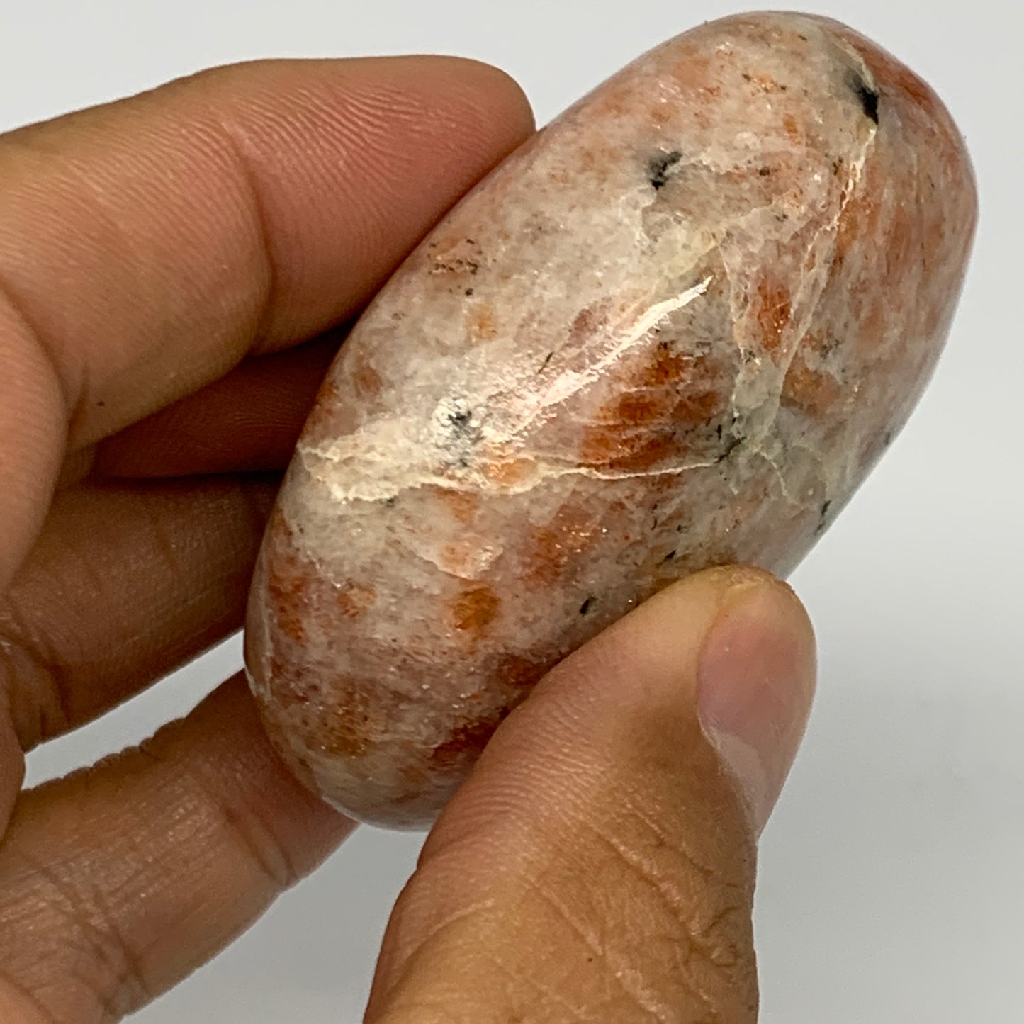 94.3g, 2.2"x1.7"x1", Natural Sunstone Palm-Stone Polished from India, B27060