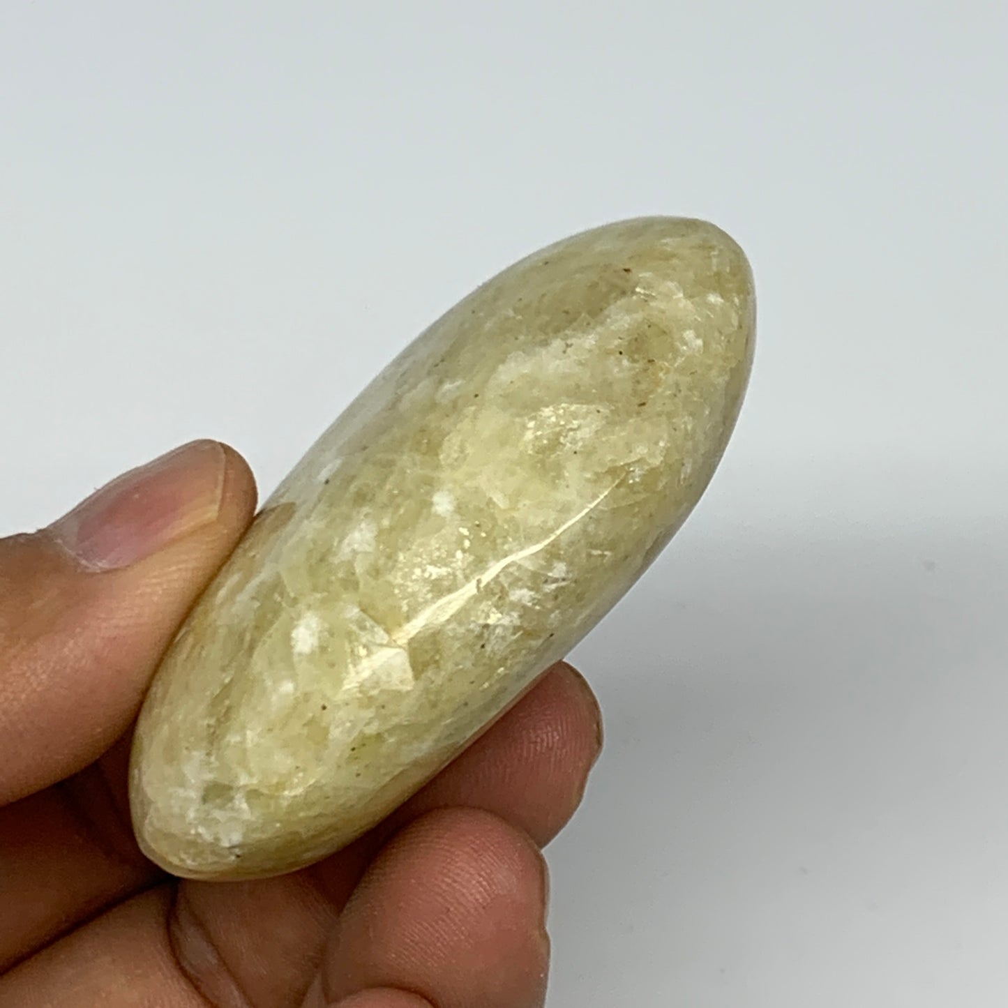 82.6g, 2.3"x1.8"x0.8", Natural Yellow Calcite Palm-Stone Crystal Polished Reiki,