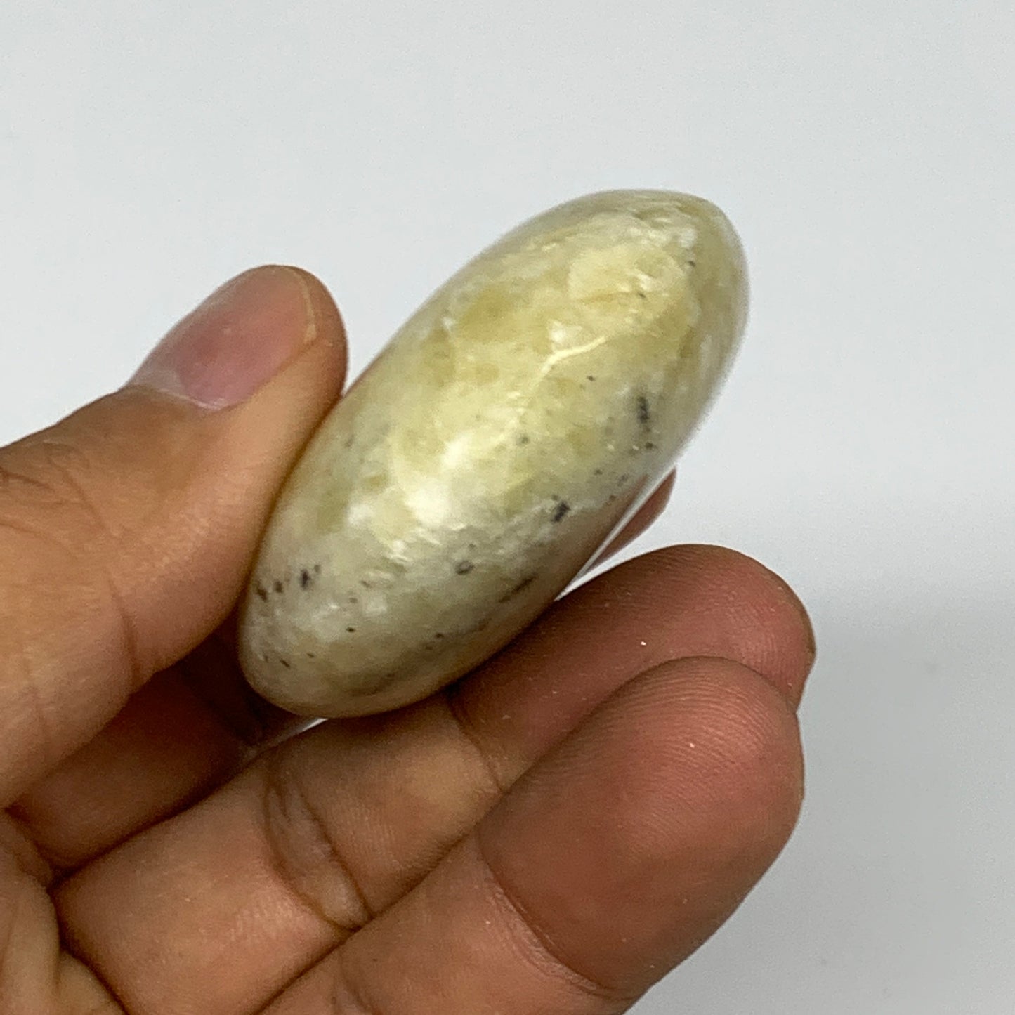 82.6g, 2.3"x1.8"x0.8", Natural Yellow Calcite Palm-Stone Crystal Polished Reiki,