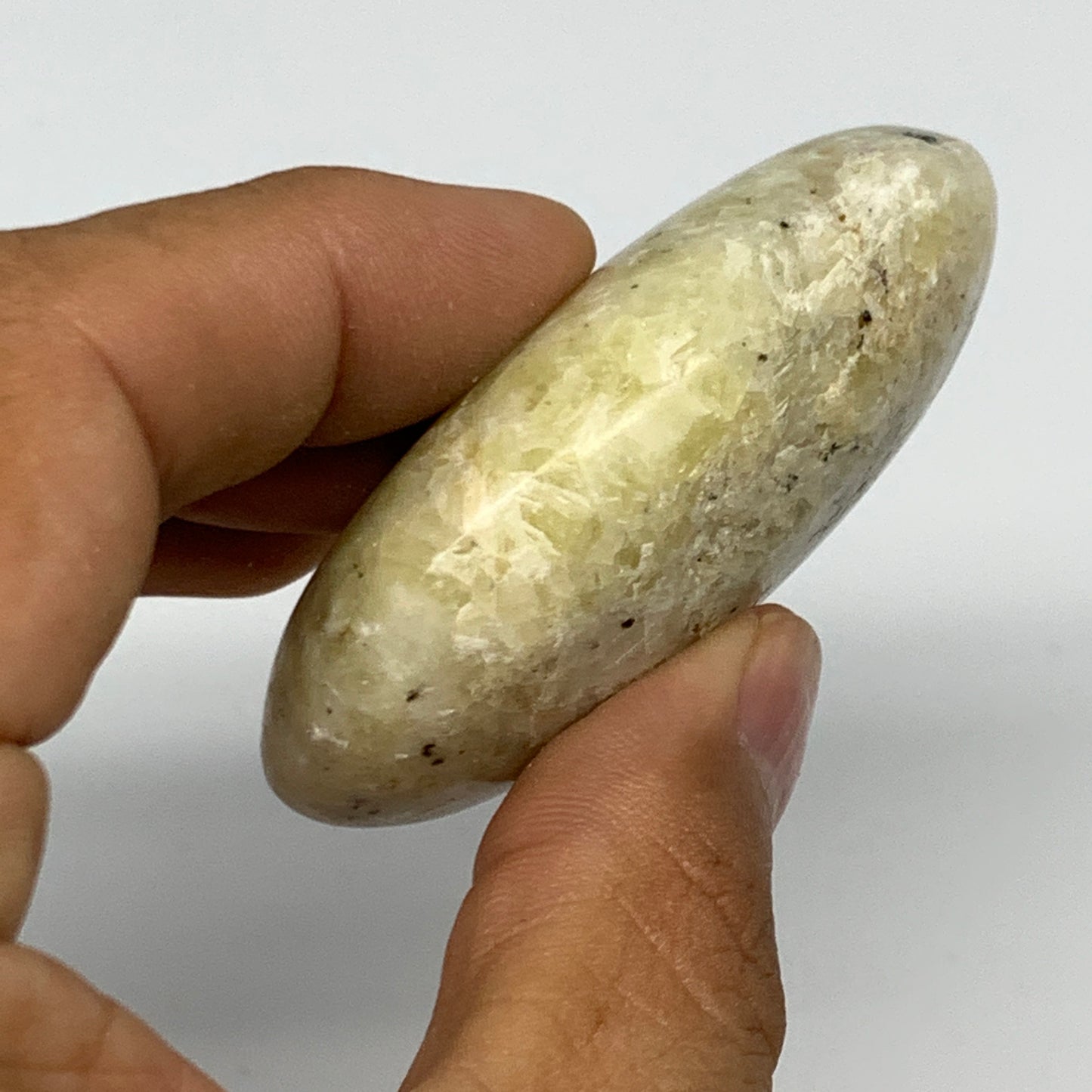 82.9g, 2.4"x1.6"x0.7", Natural Yellow Calcite Palm-Stone Crystal Polished Reiki,
