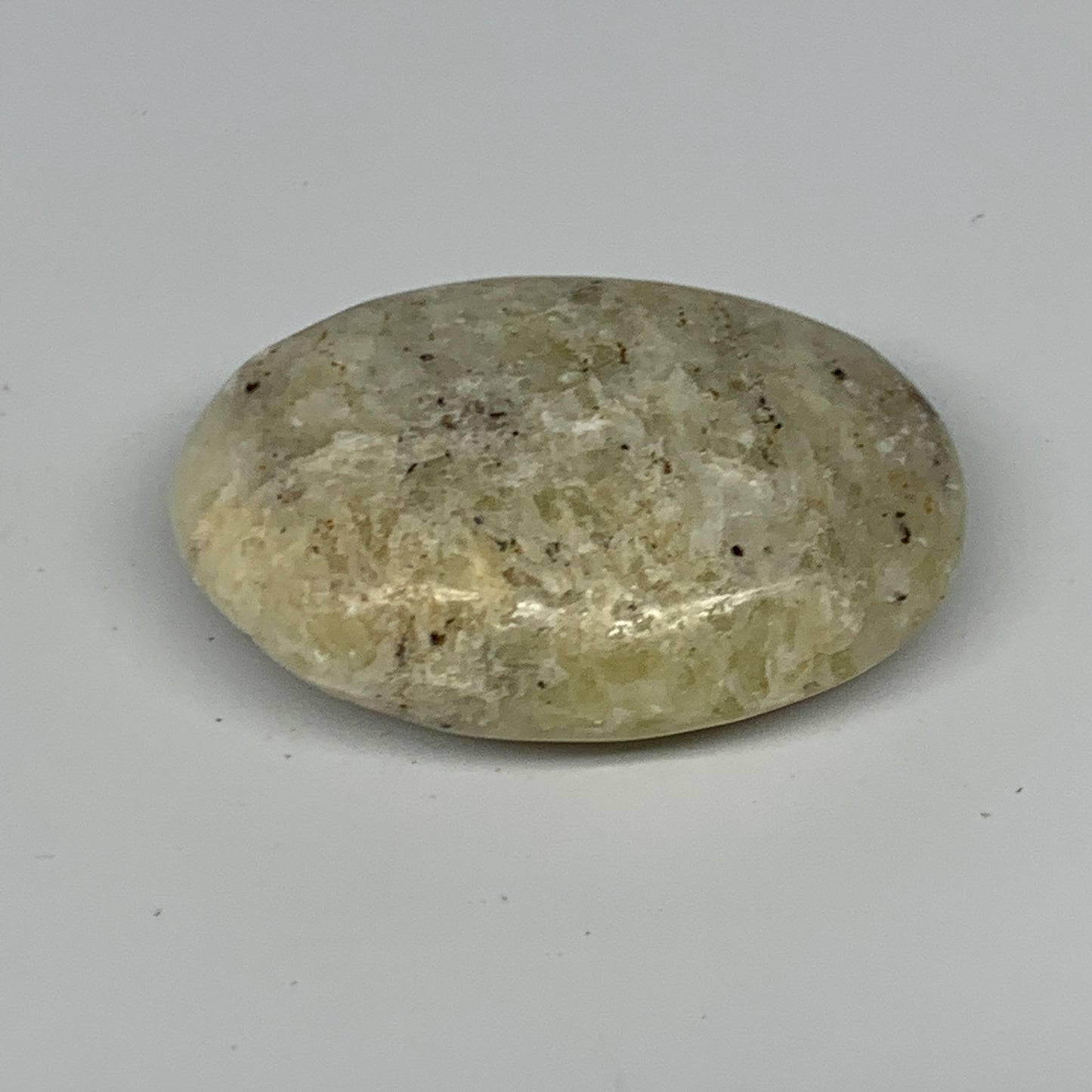 82.9g, 2.4"x1.6"x0.7", Natural Yellow Calcite Palm-Stone Crystal Polished Reiki,