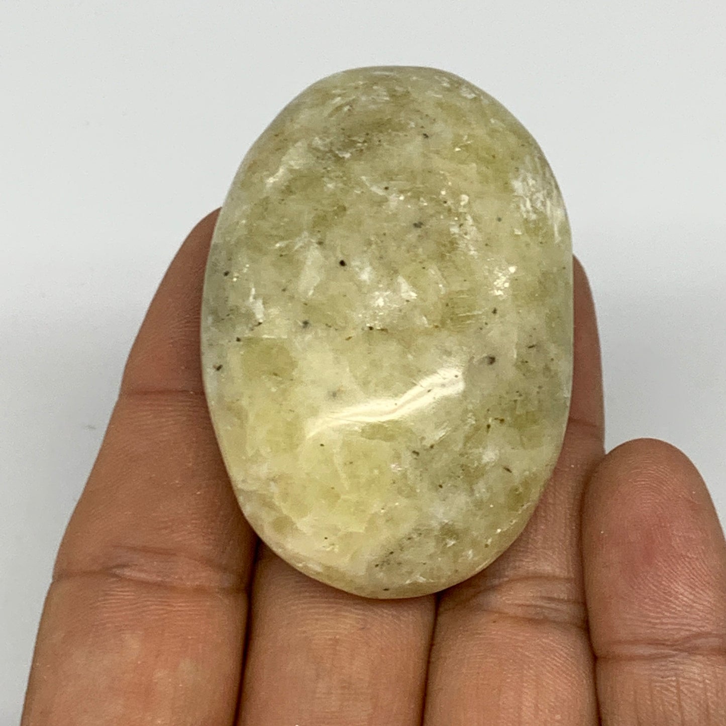 64.6g, 2.1"x1.4"x0.8", Natural Yellow Calcite Palm-Stone Crystal Polished Reiki,