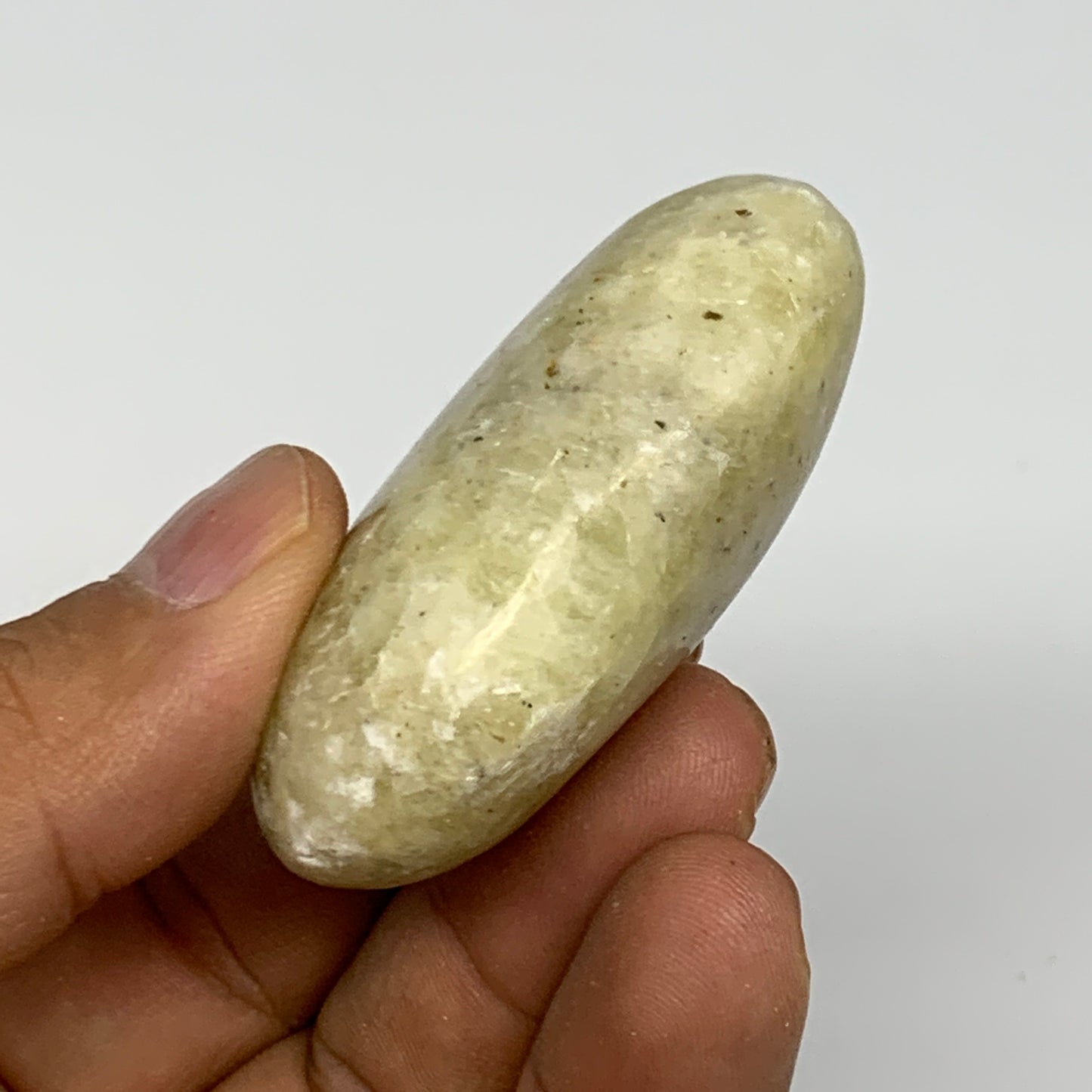 64.6g, 2.1"x1.4"x0.8", Natural Yellow Calcite Palm-Stone Crystal Polished Reiki,