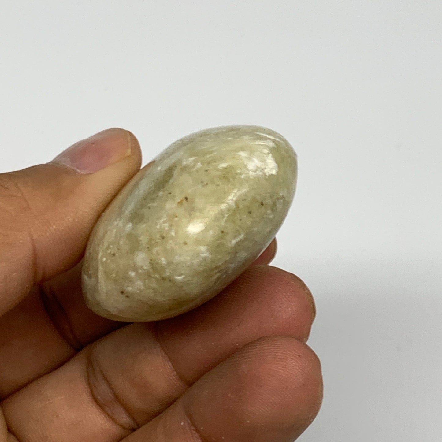64.6g, 2.1"x1.4"x0.8", Natural Yellow Calcite Palm-Stone Crystal Polished Reiki,