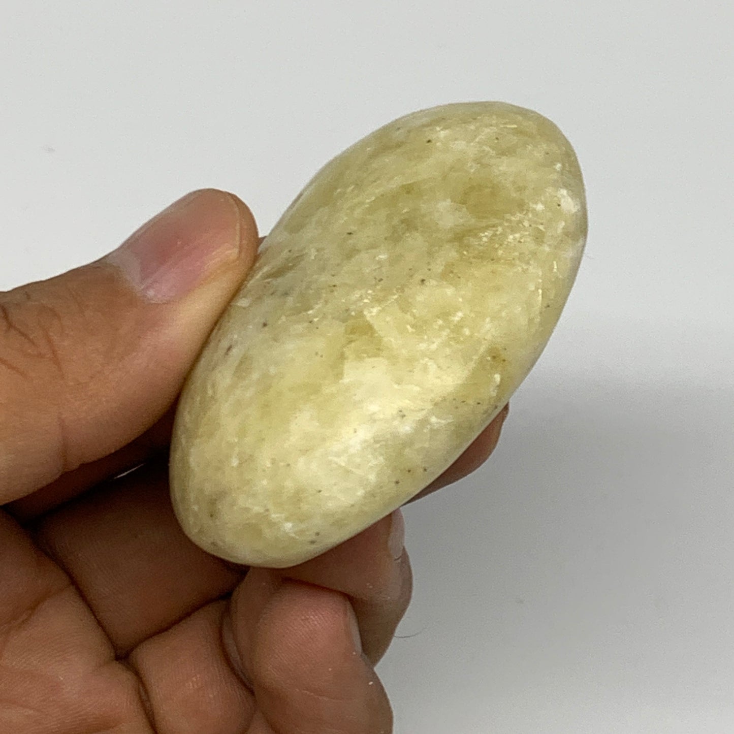 74.1g, 2.2"x1.6"x0.9", Natural Yellow Calcite Palm-Stone Crystal Polished Reiki,