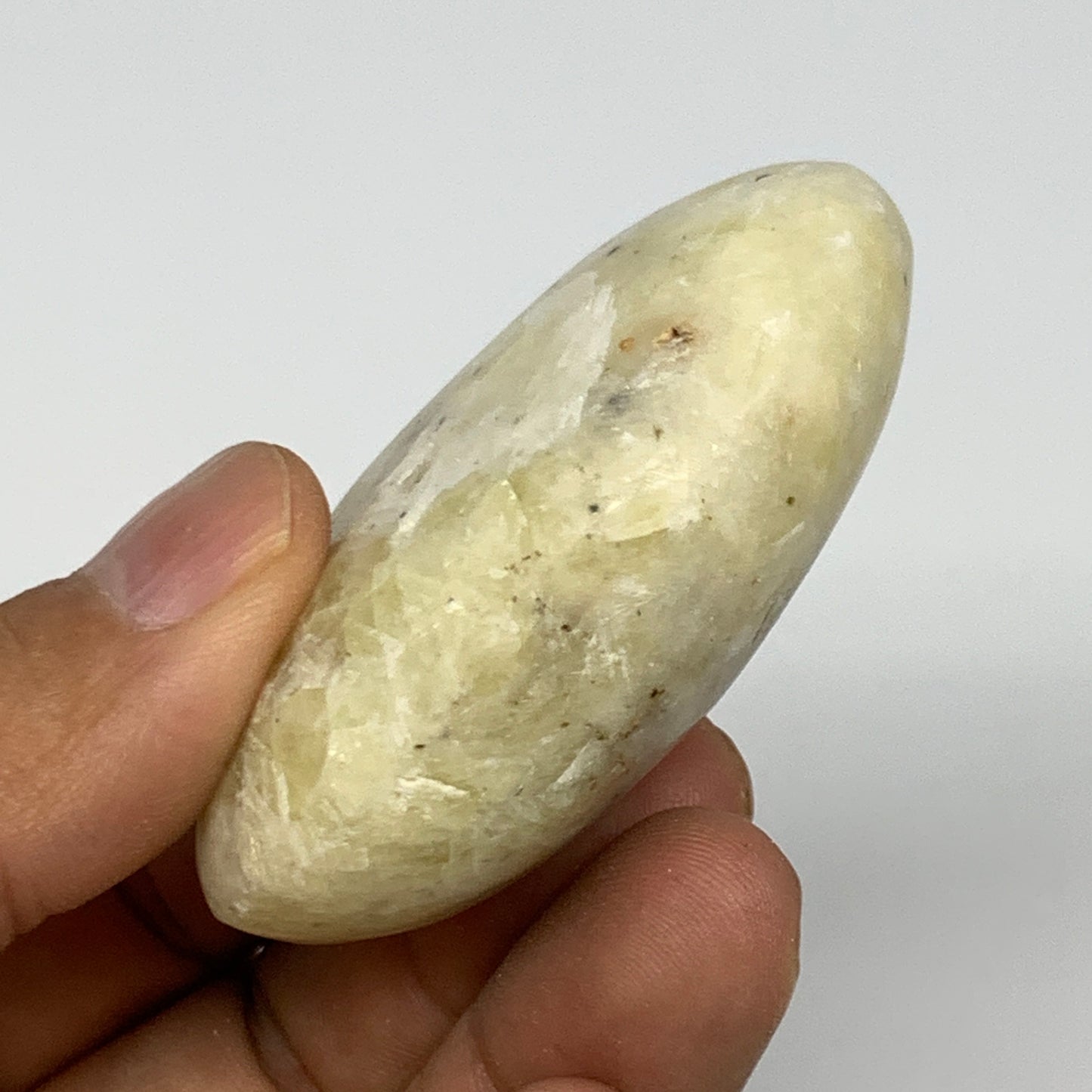 88.7g, 2.3"x1.7"x0.9", Natural Yellow Calcite Palm-Stone Crystal Polished Reiki,