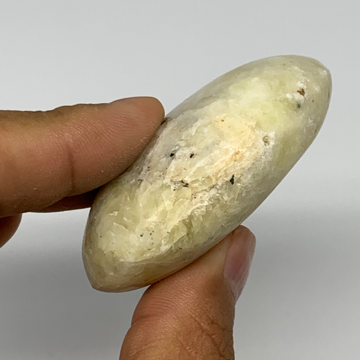 88.7g, 2.3"x1.7"x0.9", Natural Yellow Calcite Palm-Stone Crystal Polished Reiki,