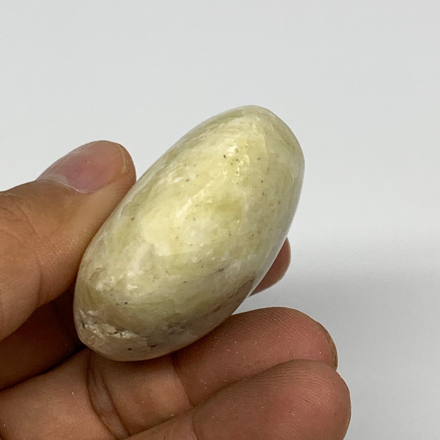 88.7g, 2.3"x1.7"x0.9", Natural Yellow Calcite Palm-Stone Crystal Polished Reiki,
