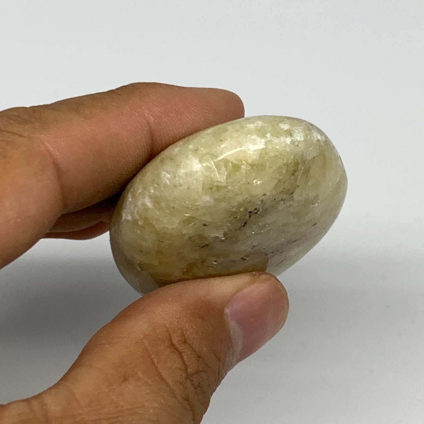 64.1g, 2.1"x1.5"x0.8", Natural Yellow Calcite Palm-Stone Crystal Polished Reiki,