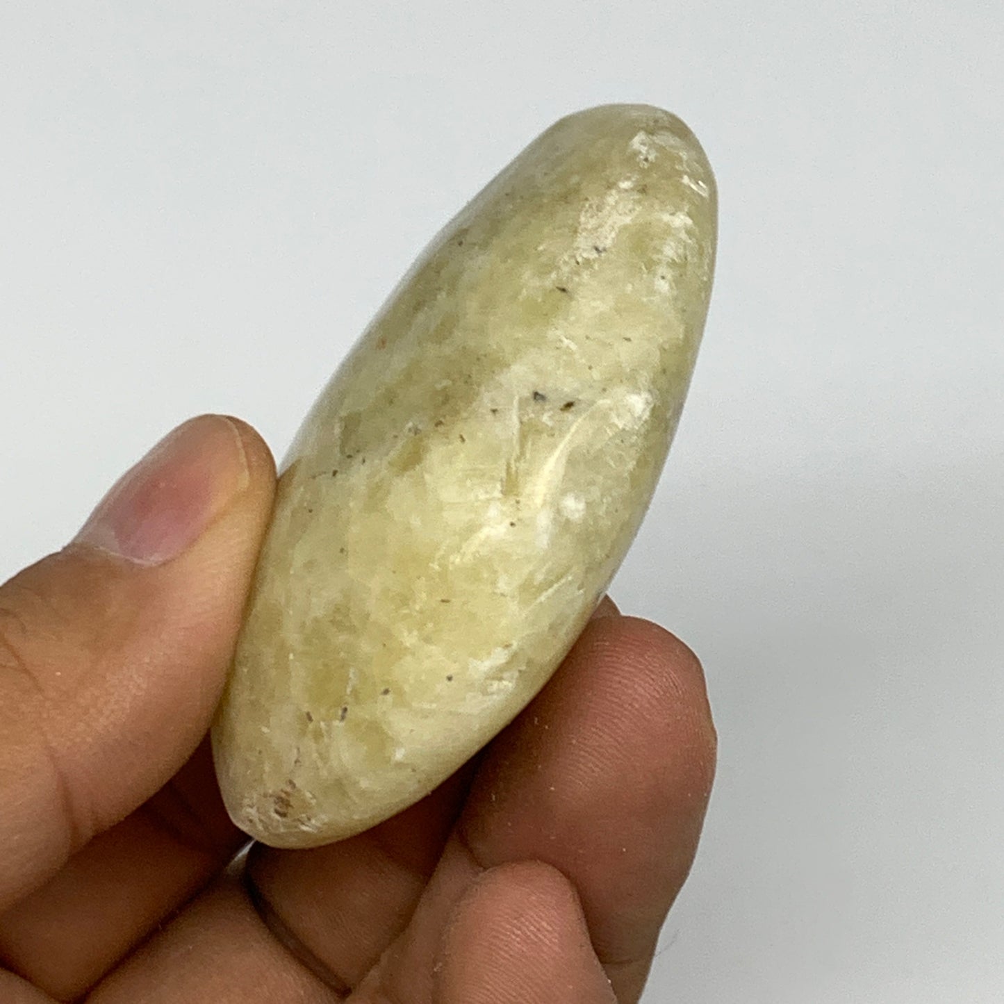 74.6g, 2.2"x1.7"x0.8", Natural Yellow Calcite Palm-Stone Crystal Polished Reiki,