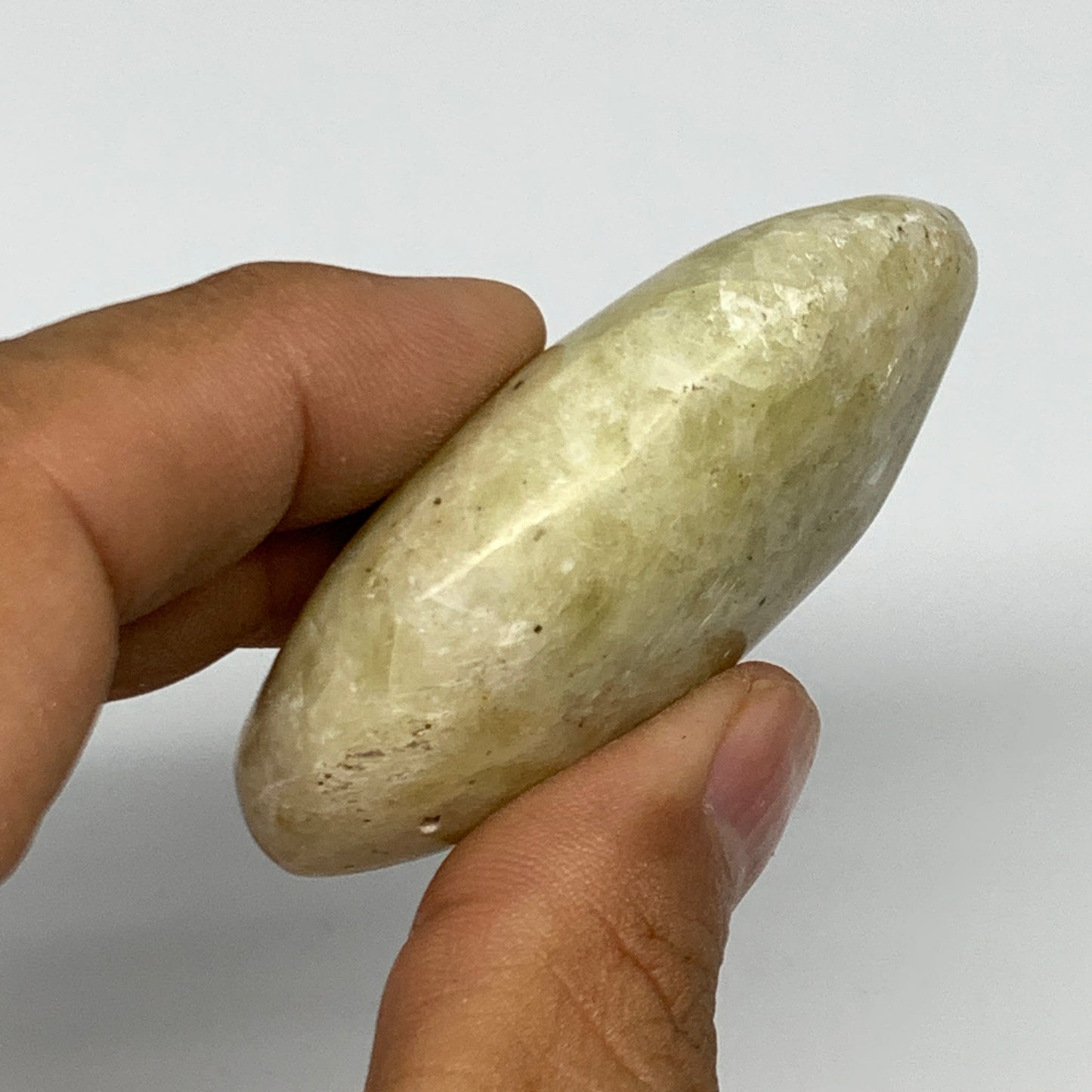 74.6g, 2.2"x1.7"x0.8", Natural Yellow Calcite Palm-Stone Crystal Polished Reiki,