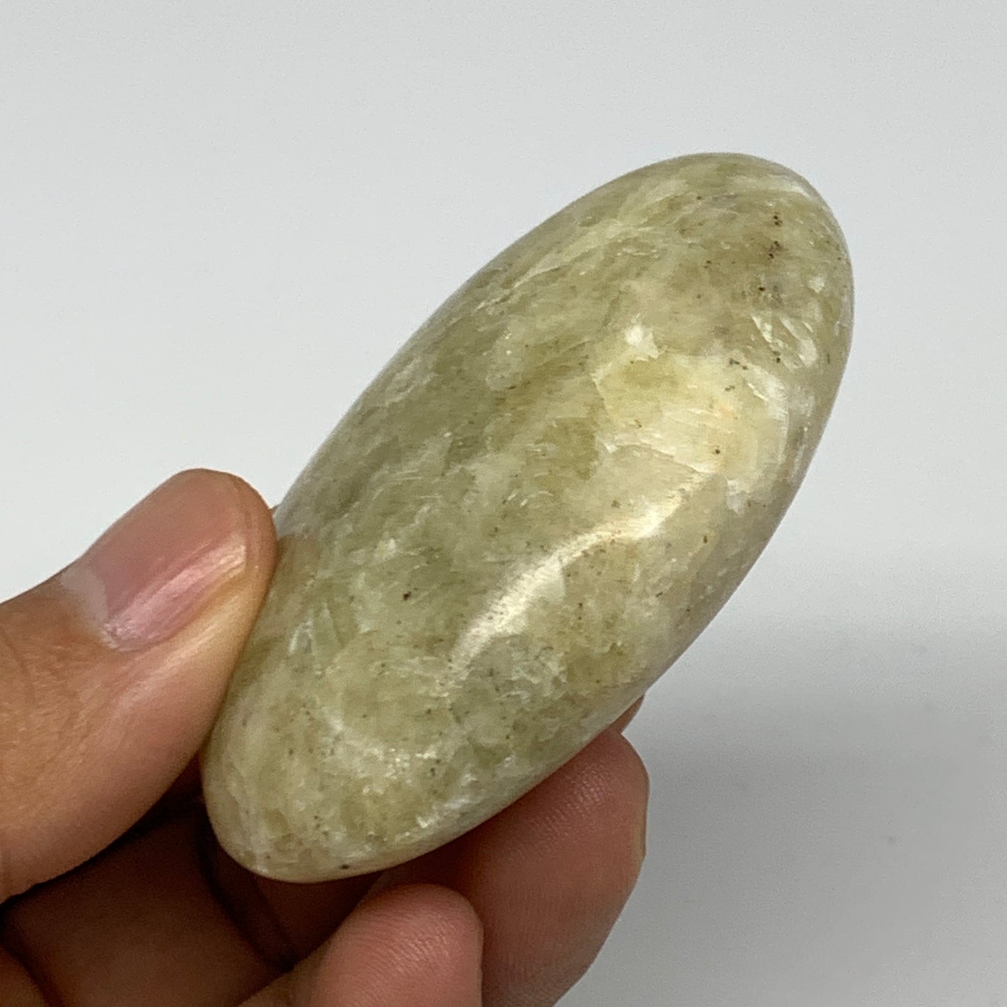 94.1g, 2.5"x1.7"x0.9", Natural Yellow Calcite Palm-Stone Crystal Polished Reiki,