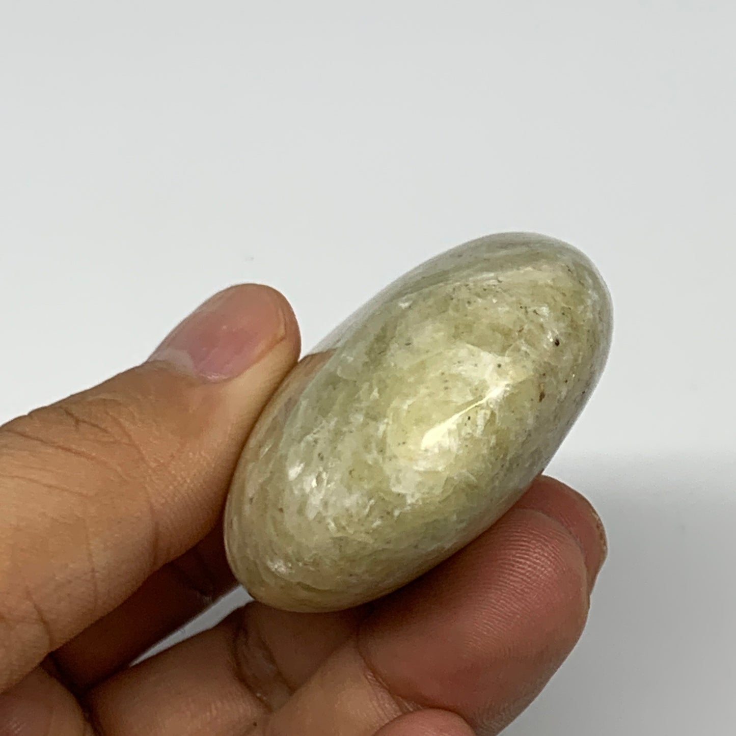 94.1g, 2.5"x1.7"x0.9", Natural Yellow Calcite Palm-Stone Crystal Polished Reiki,