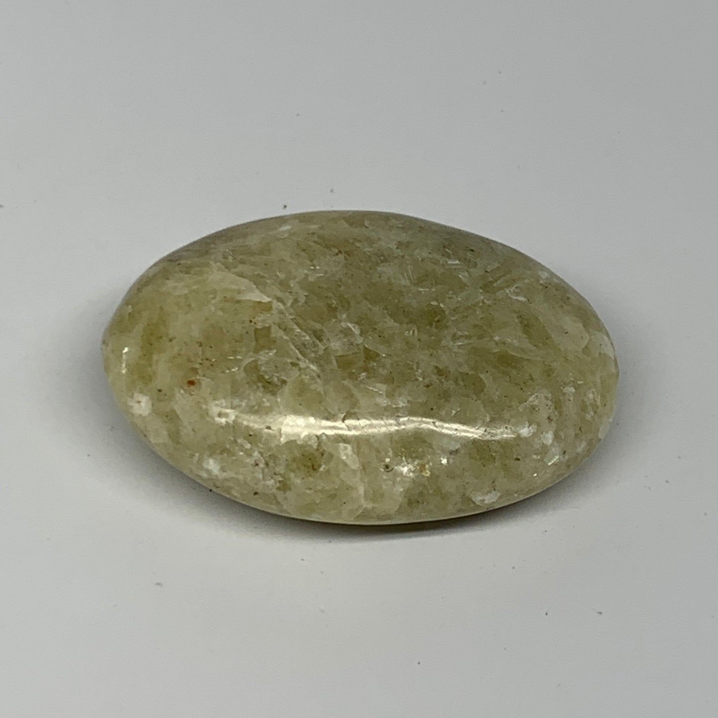 94.1g, 2.5"x1.7"x0.9", Natural Yellow Calcite Palm-Stone Crystal Polished Reiki,