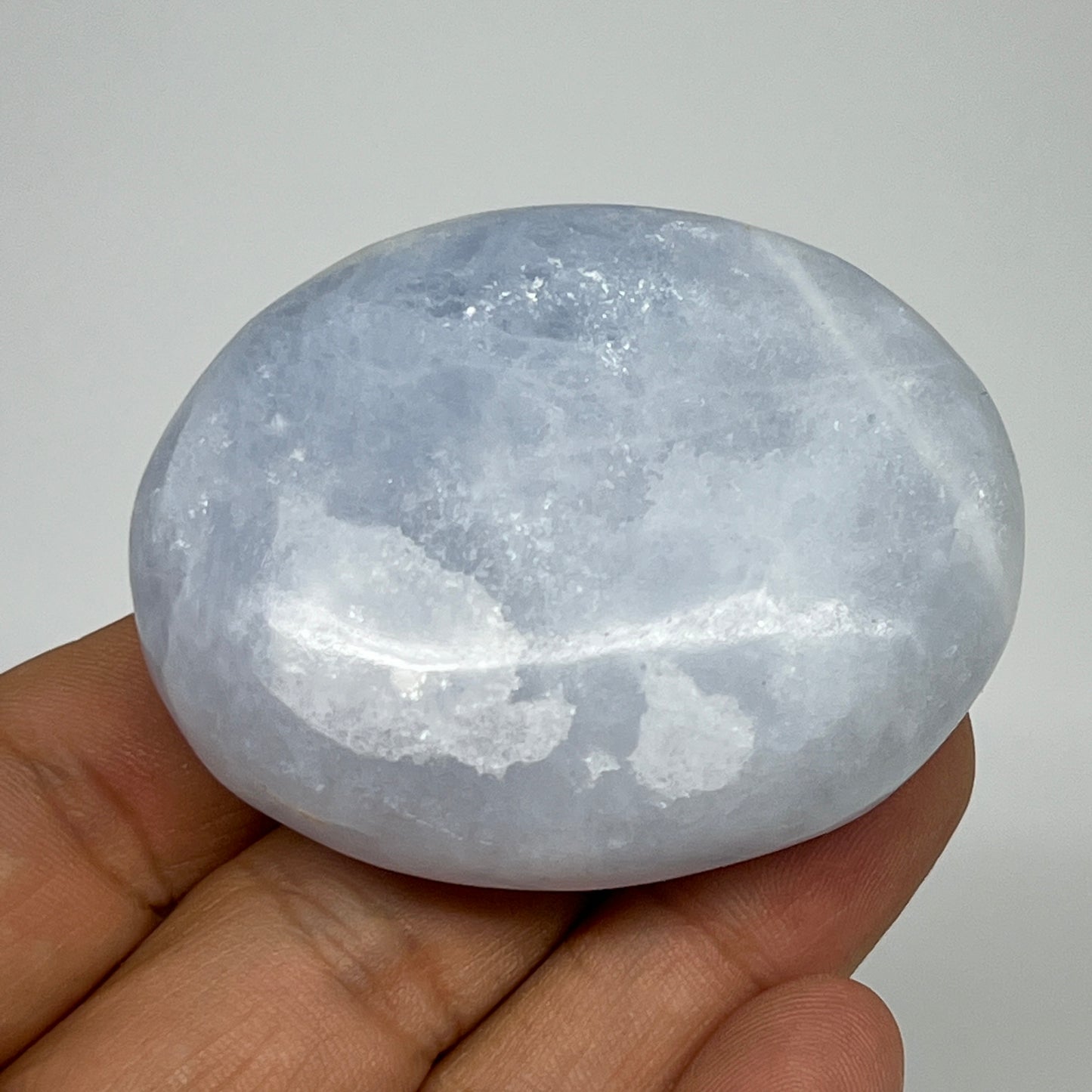 87.2g, 2.2"x1.7"x0.9" Blue Calcite Small Palm-Stone Tumbled @Madagascar, B20725