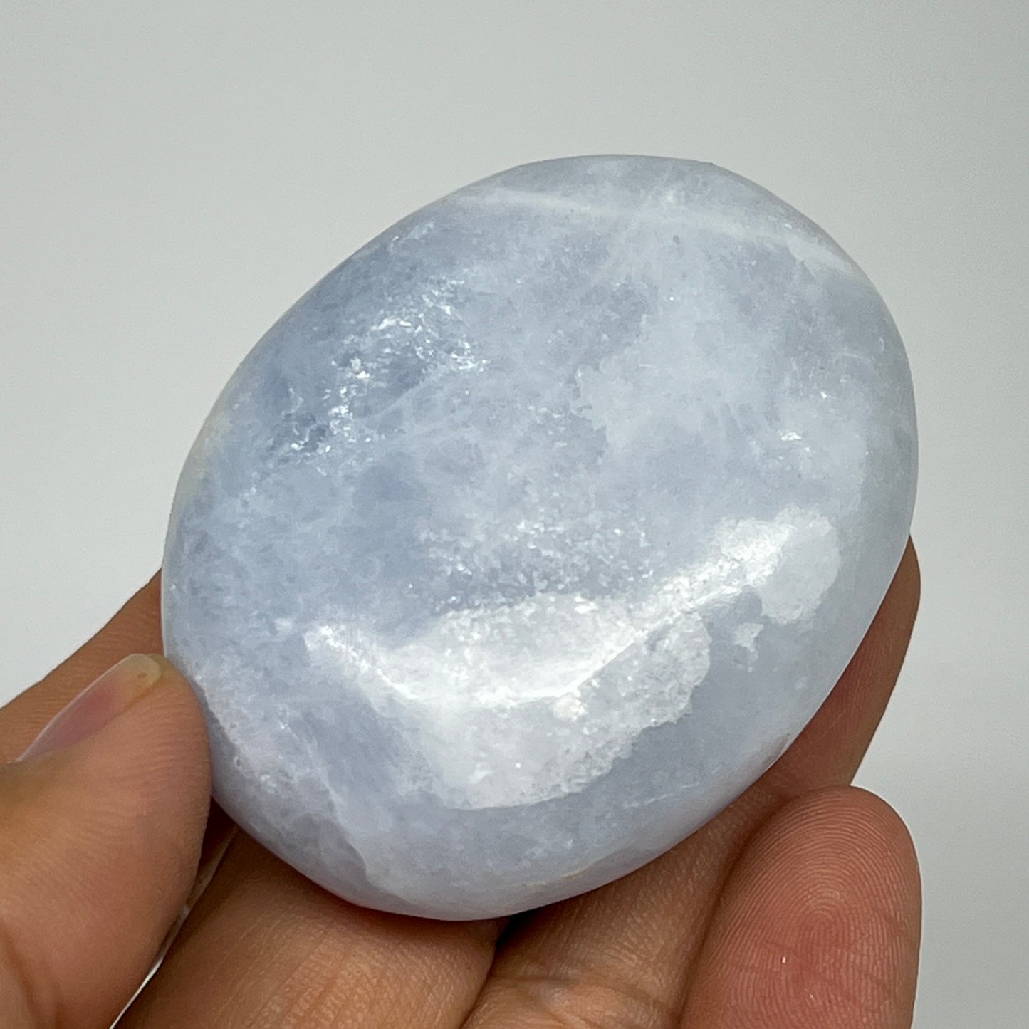 87.2g, 2.2"x1.7"x0.9" Blue Calcite Small Palm-Stone Tumbled @Madagascar, B20725