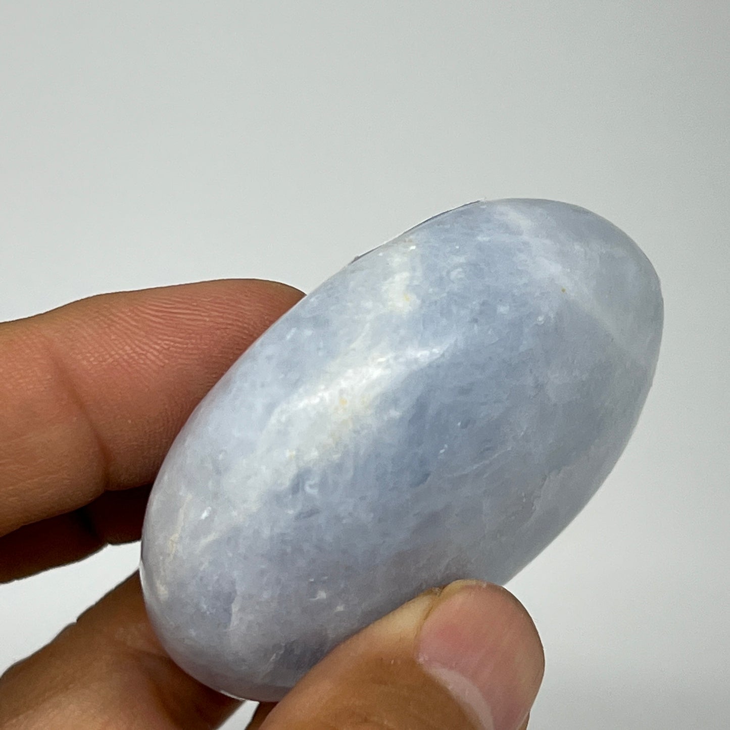 87.2g, 2.2"x1.7"x0.9" Blue Calcite Small Palm-Stone Tumbled @Madagascar, B20725