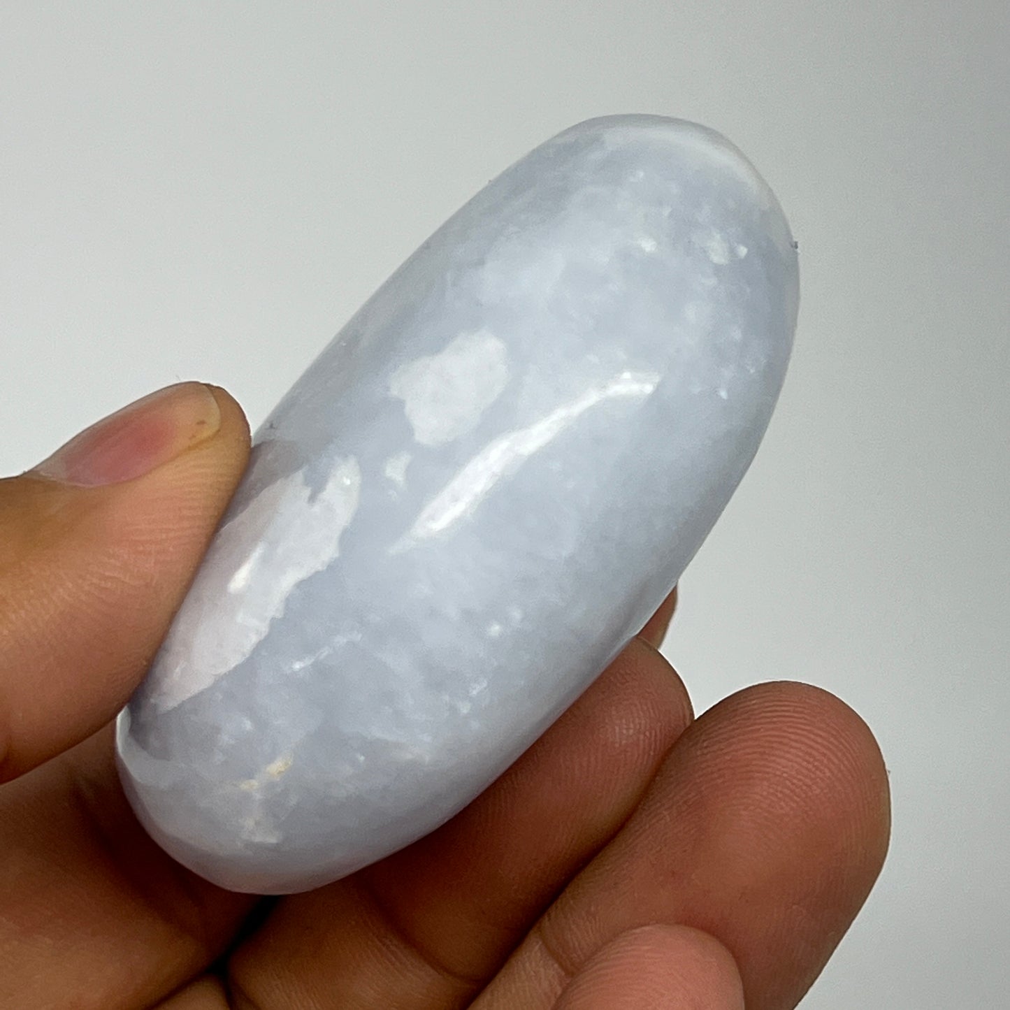 87.2g, 2.2"x1.7"x0.9" Blue Calcite Small Palm-Stone Tumbled @Madagascar, B20725