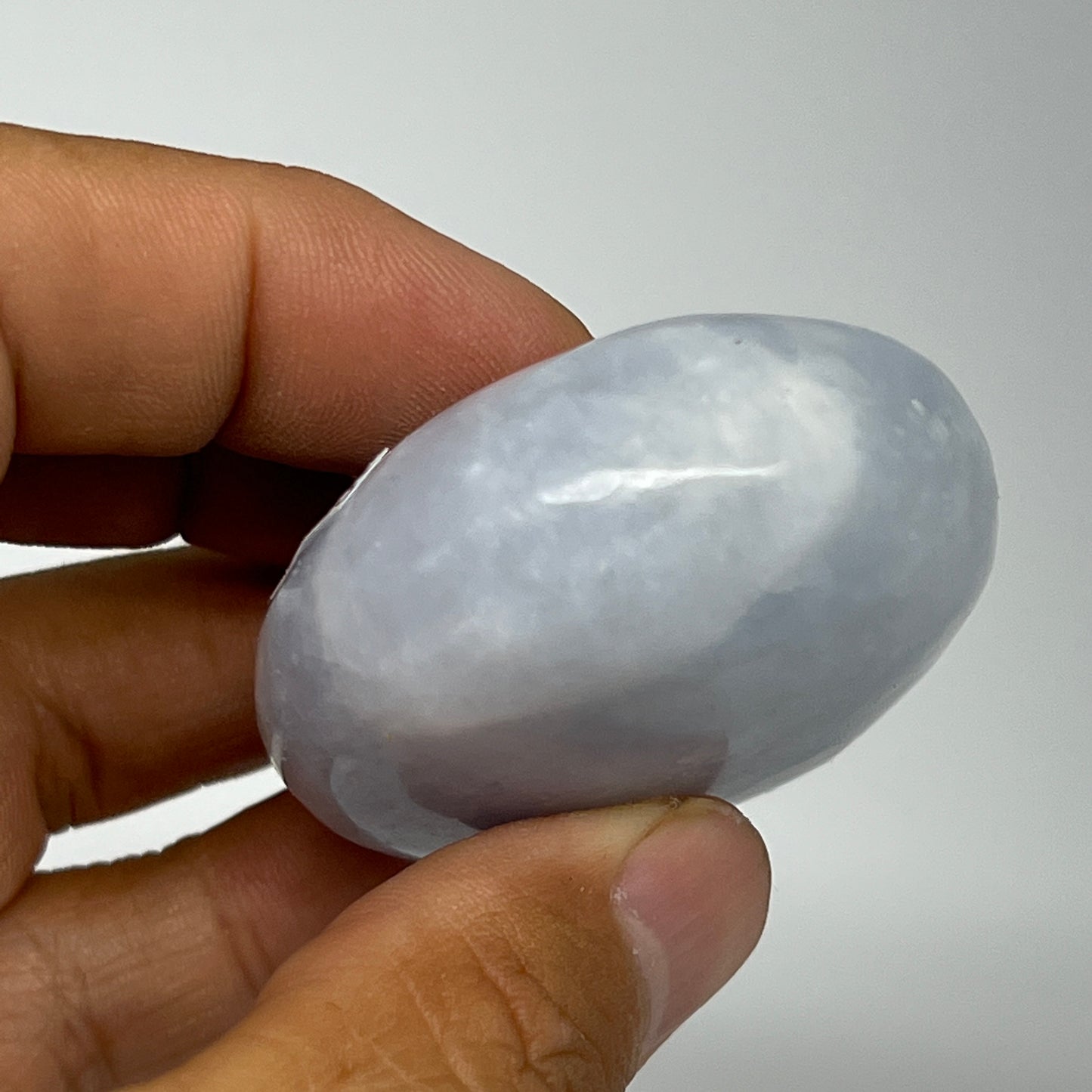 87.2g, 2.2"x1.7"x0.9" Blue Calcite Small Palm-Stone Tumbled @Madagascar, B20725
