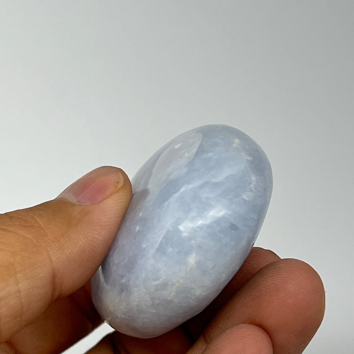 87.2g, 2.2"x1.7"x0.9" Blue Calcite Small Palm-Stone Tumbled @Madagascar, B20725