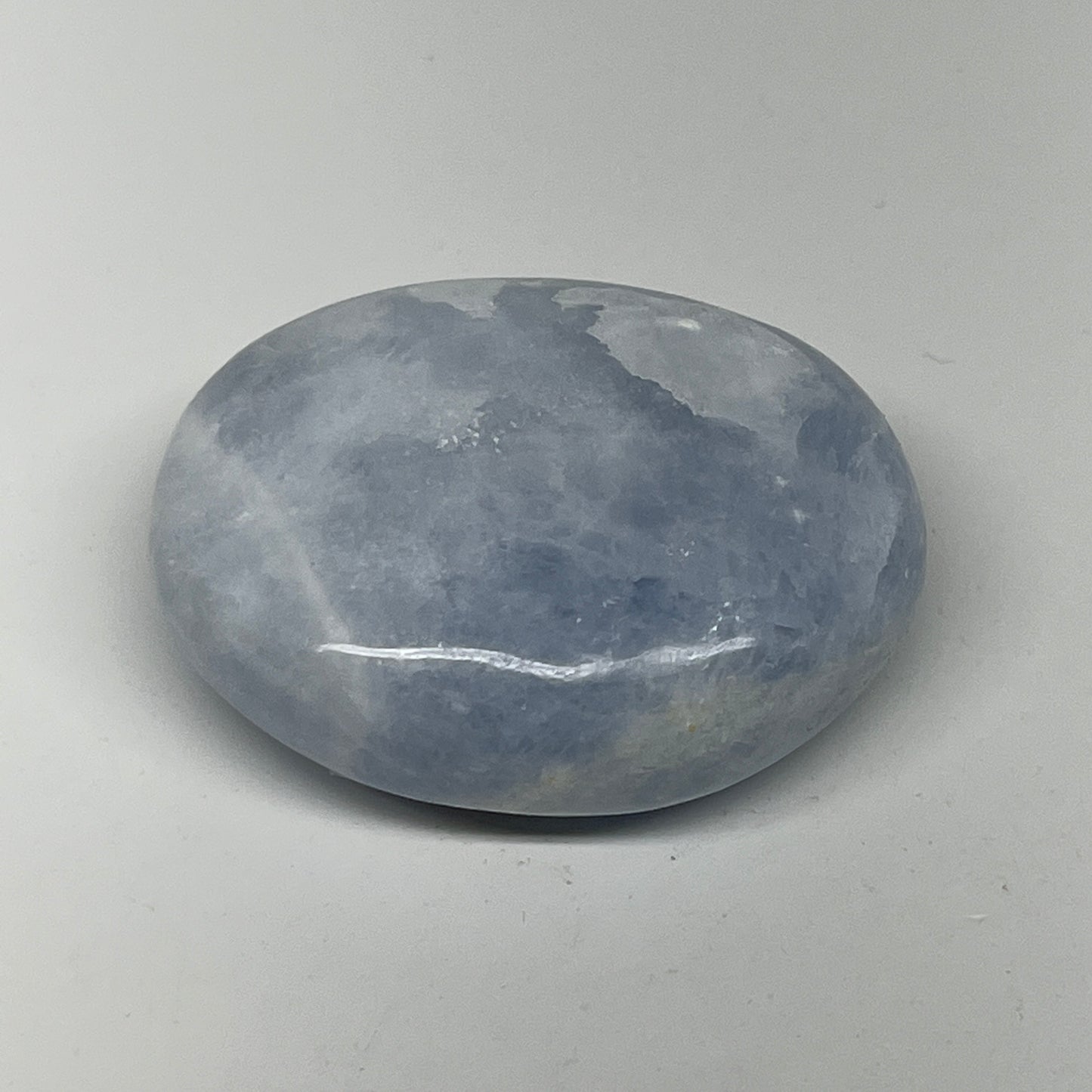 87.2g, 2.2"x1.7"x0.9" Blue Calcite Small Palm-Stone Tumbled @Madagascar, B20725