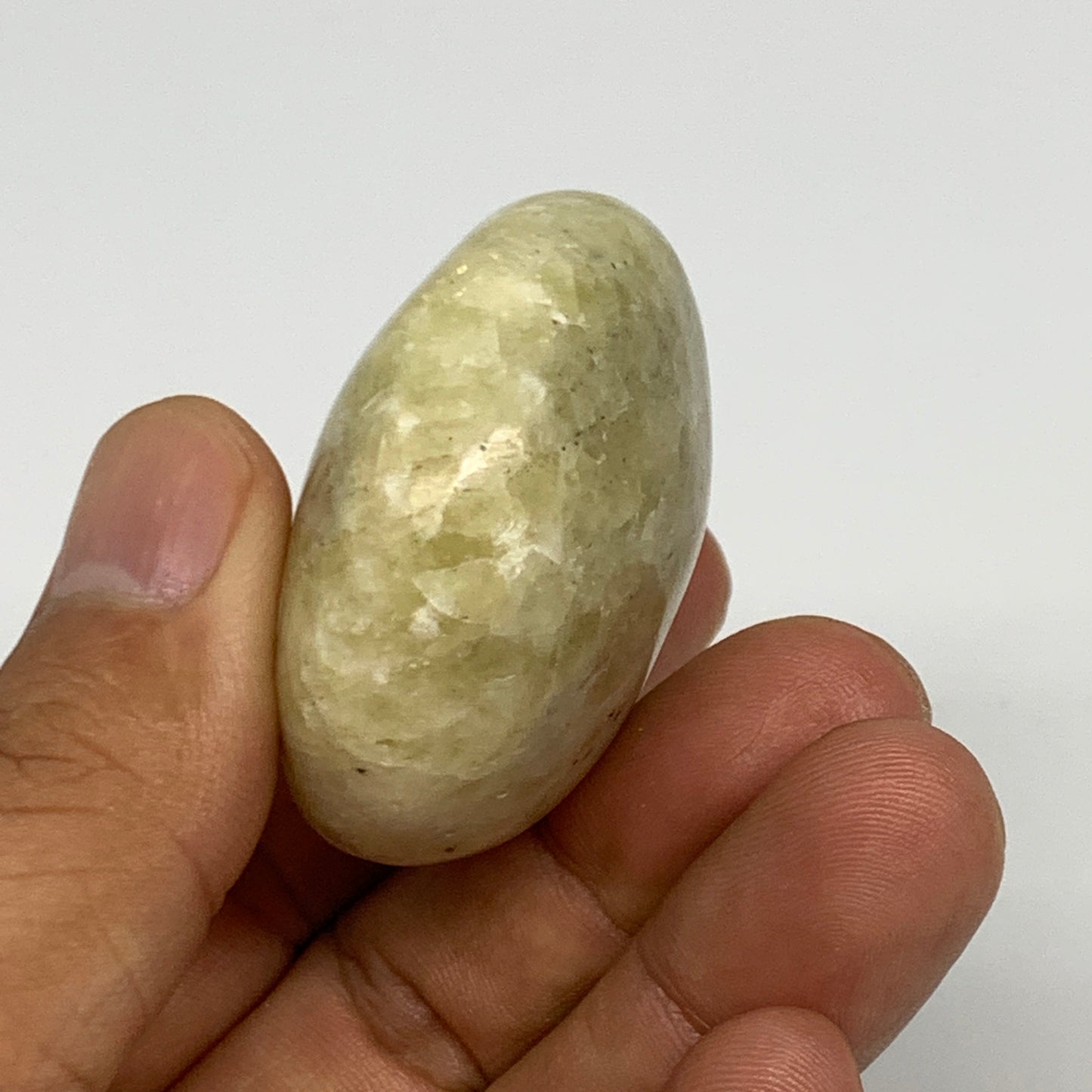 75.8g, 2"x1.7"x0.9", Natural Yellow Calcite Palm-Stone Crystal Polished Reiki, B