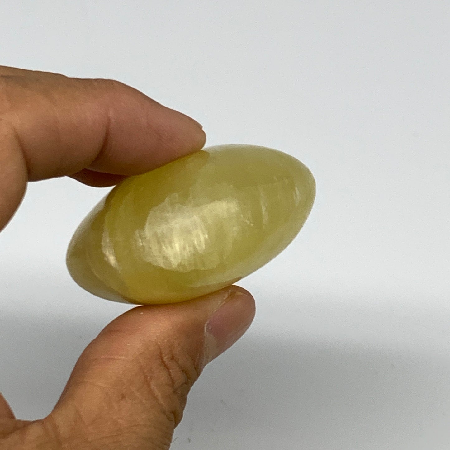 117.8g, 2.6"x1.8"x1", Lemon Calcite Palm-Stone Crystal Polished @Pakistan,B25499